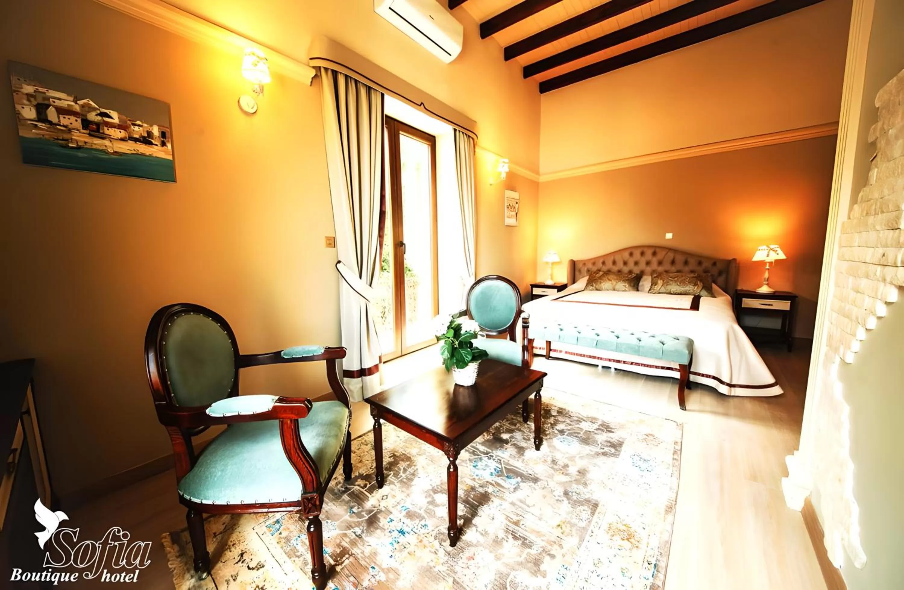 Bed in SOFIA BOUTIQUE HOTEL