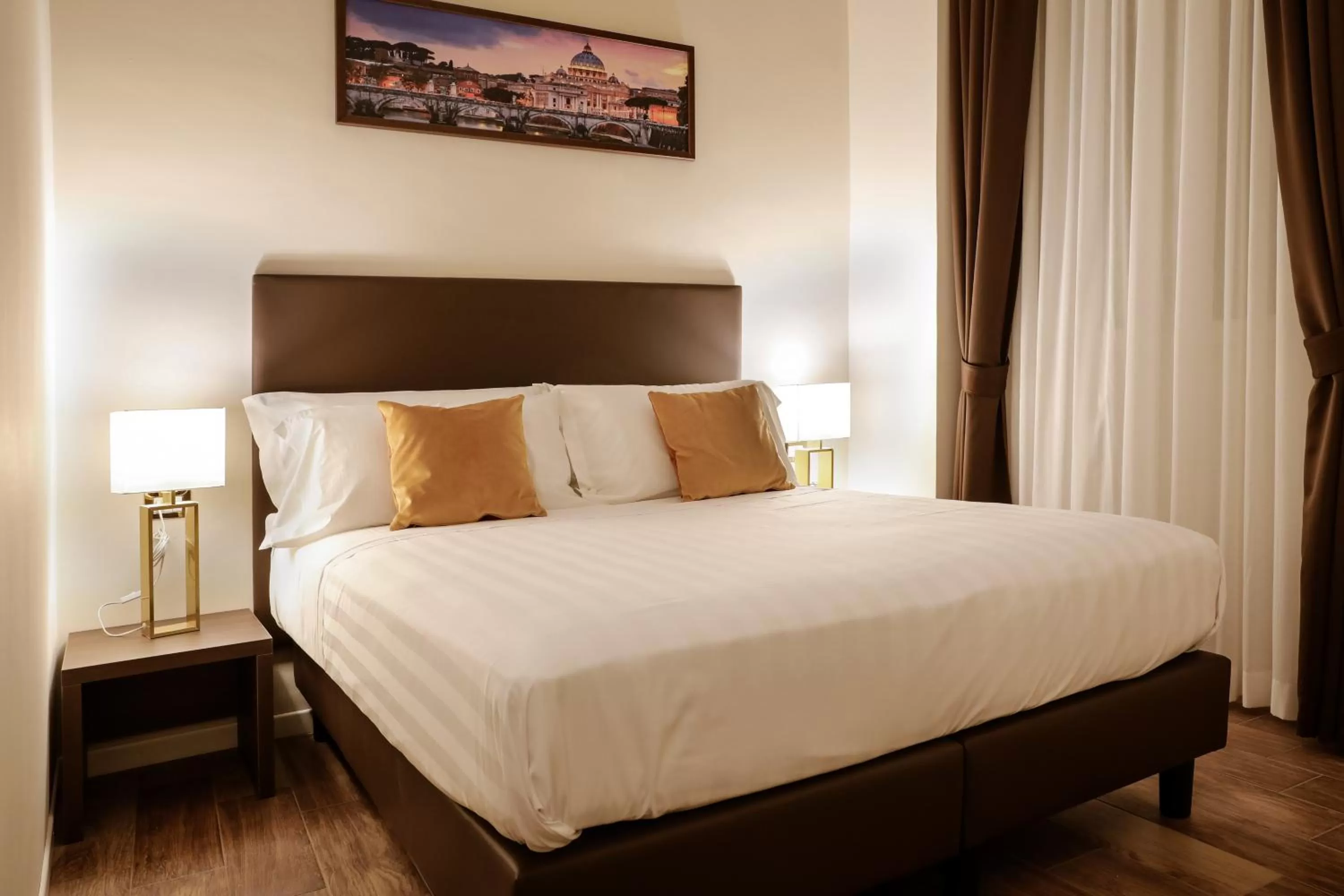 Bed in Elegant Rooms Roma - Guest House