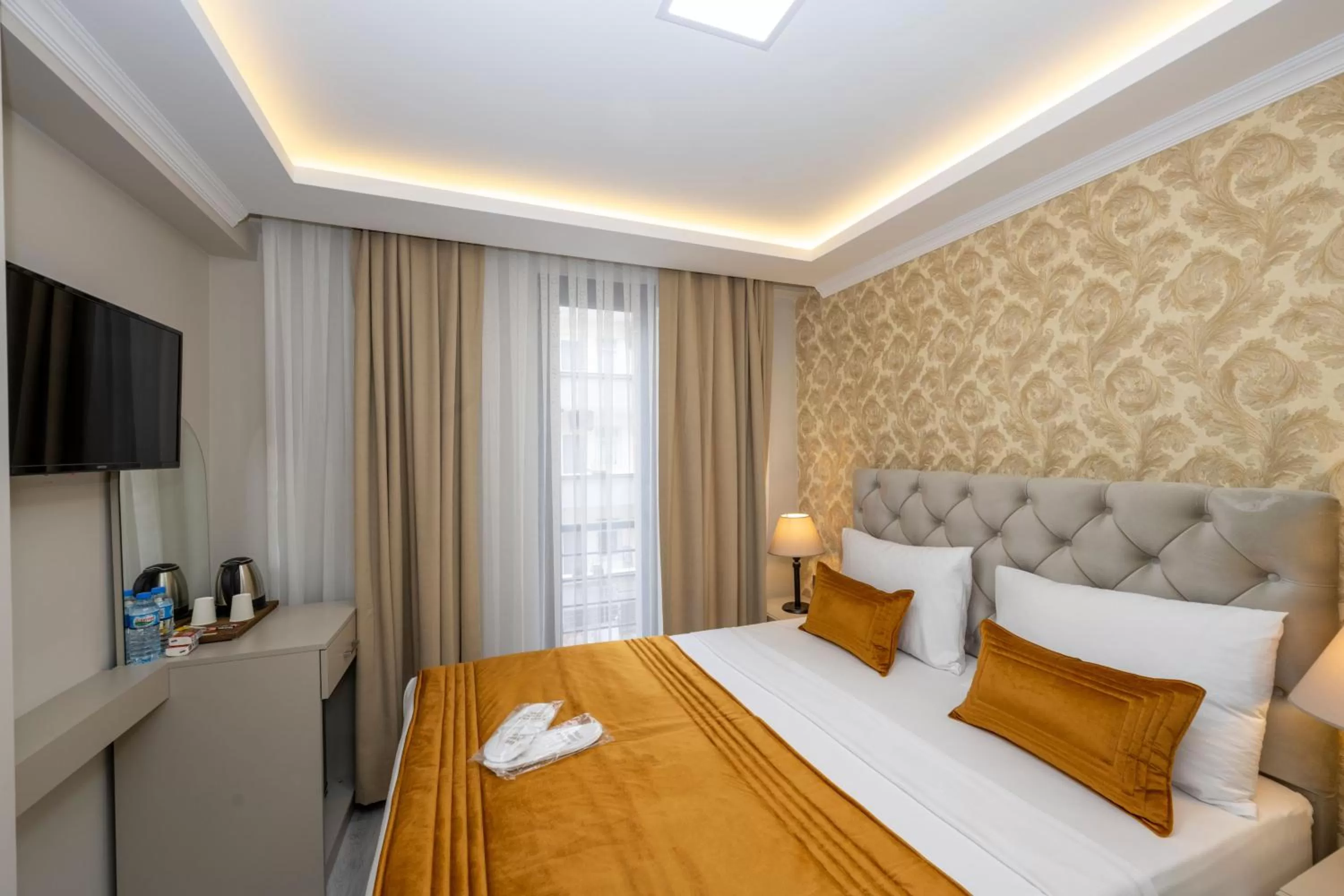 Bed in SKYSTAR DELUXE HOTEL