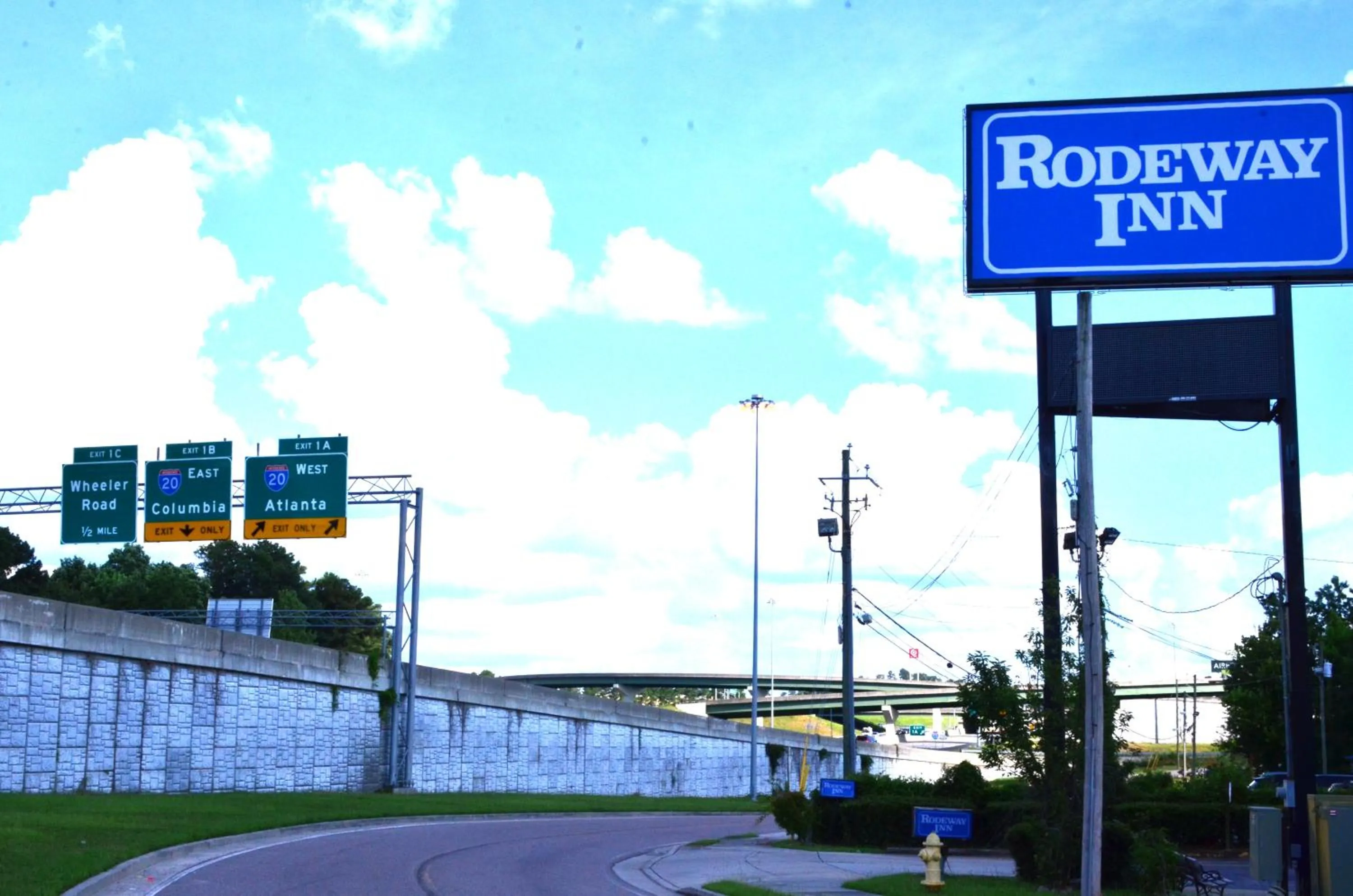 Property logo or sign in Rodeway Inn Augusta West - Fort Gordon