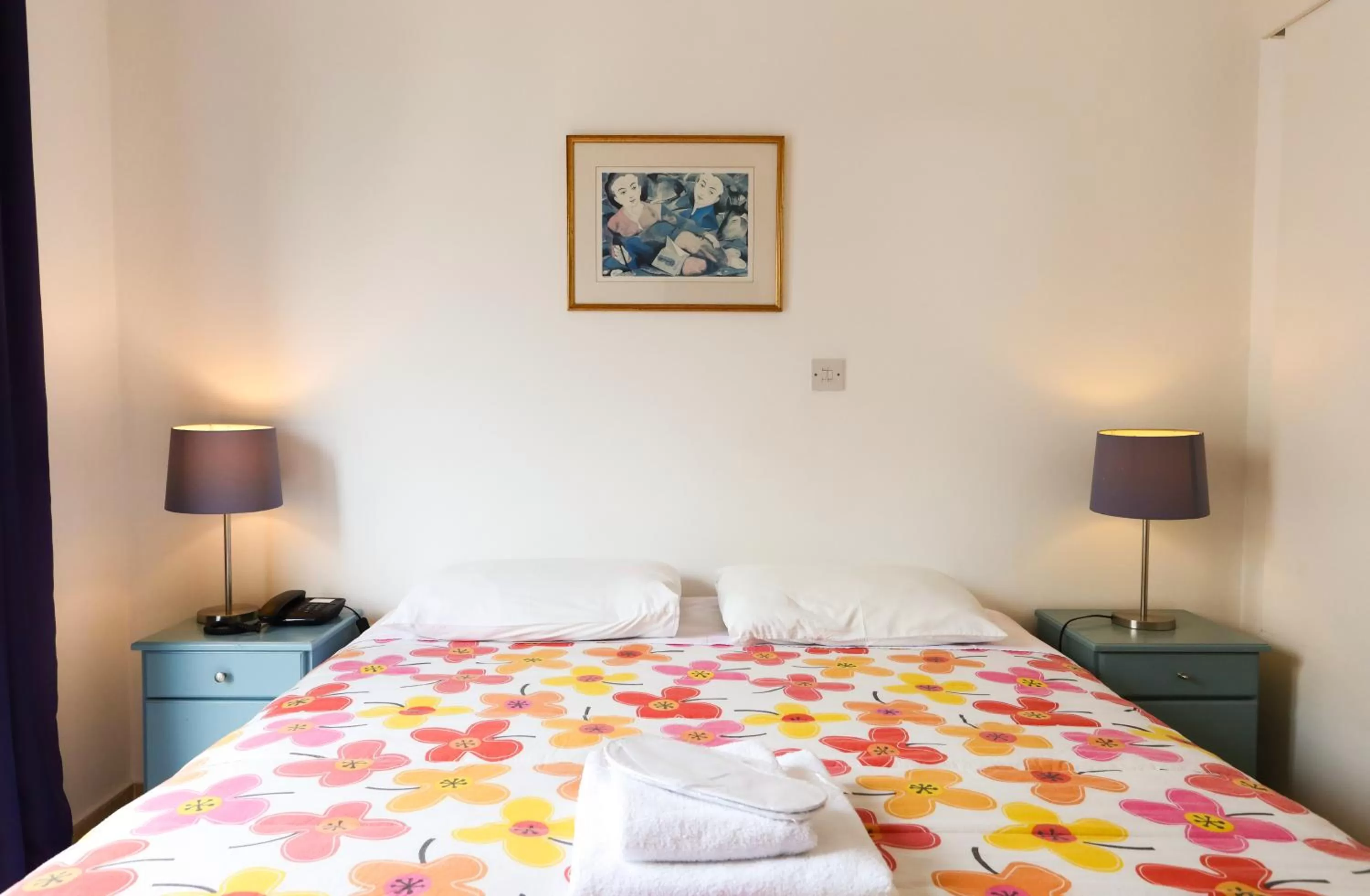 Bed in Axiothea Hotel