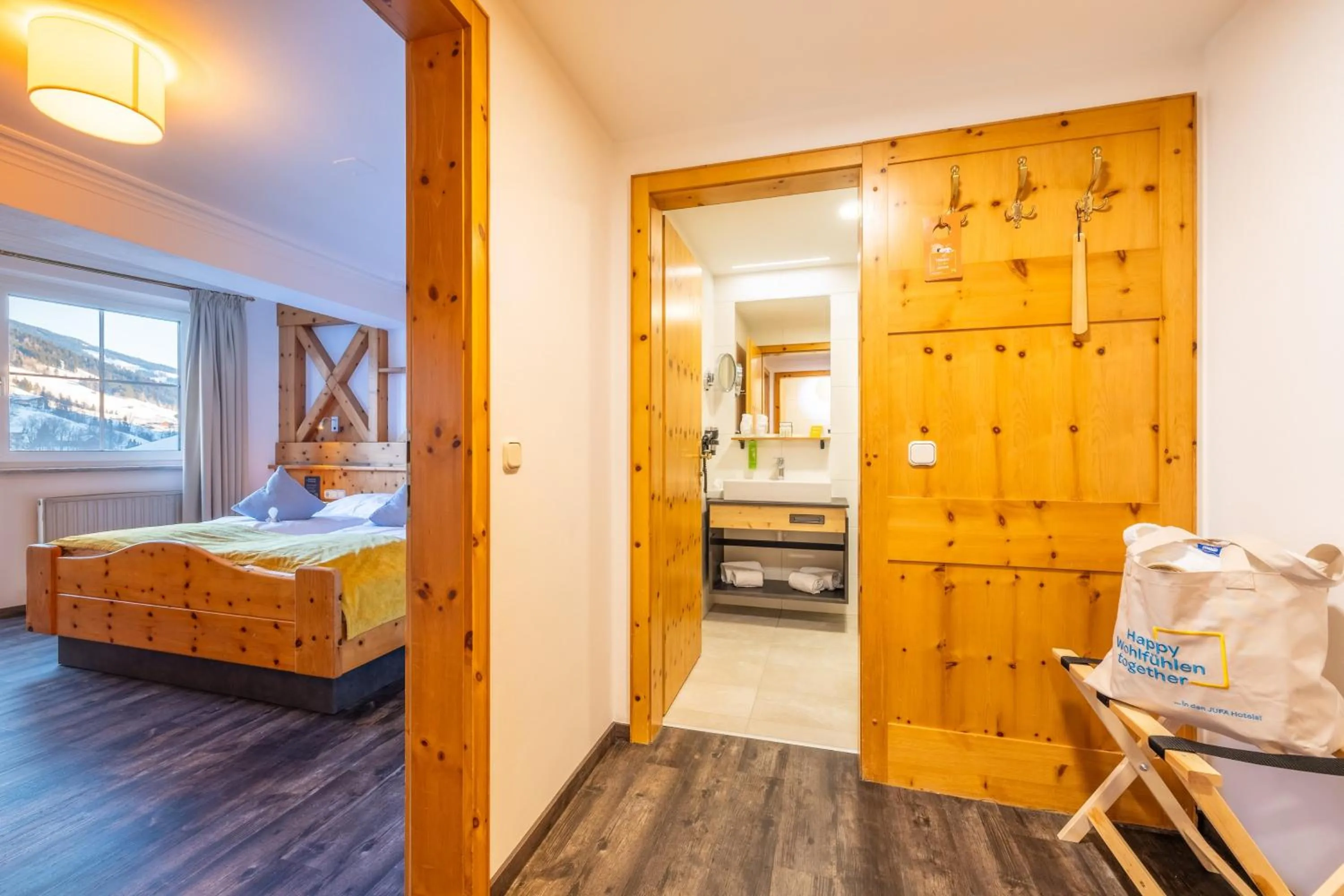 Photo of the whole room, Bed in JUFA Alpenhotel Saalbach