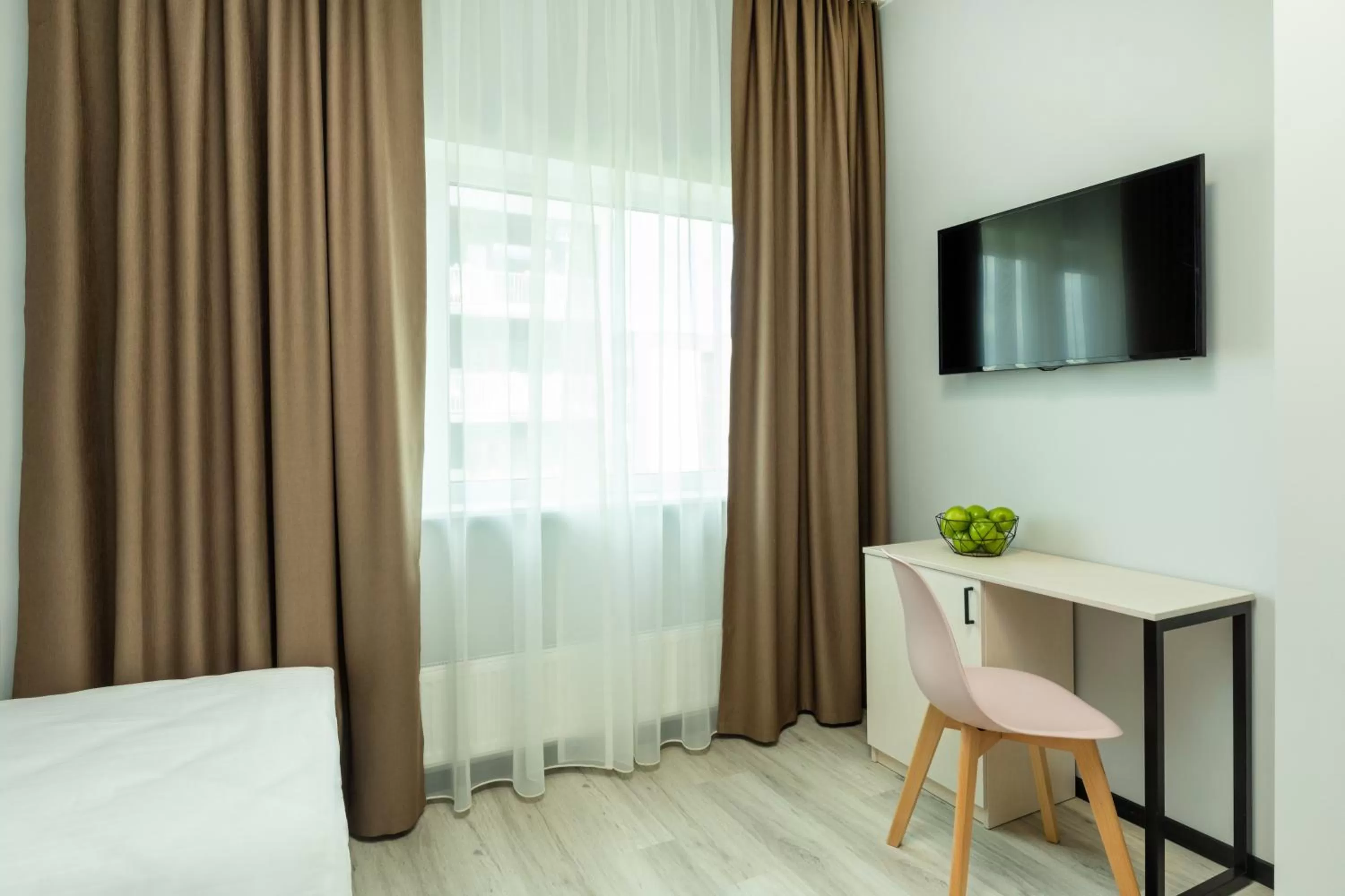 Photo of the whole room, TV/Entertainment Center in U11 Hotel