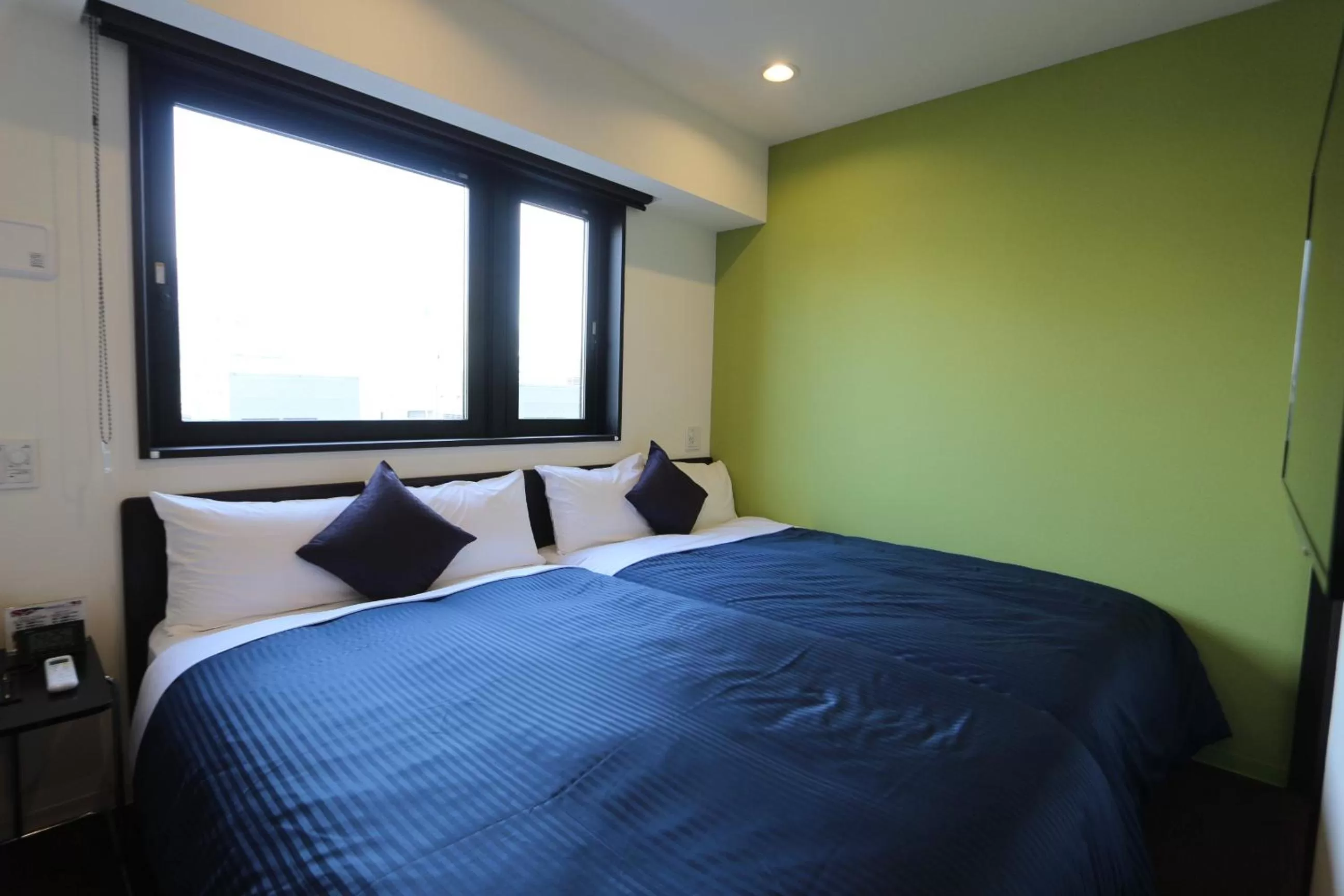 Bed in HOTEL LiVEMAX Ueno-Ekimae