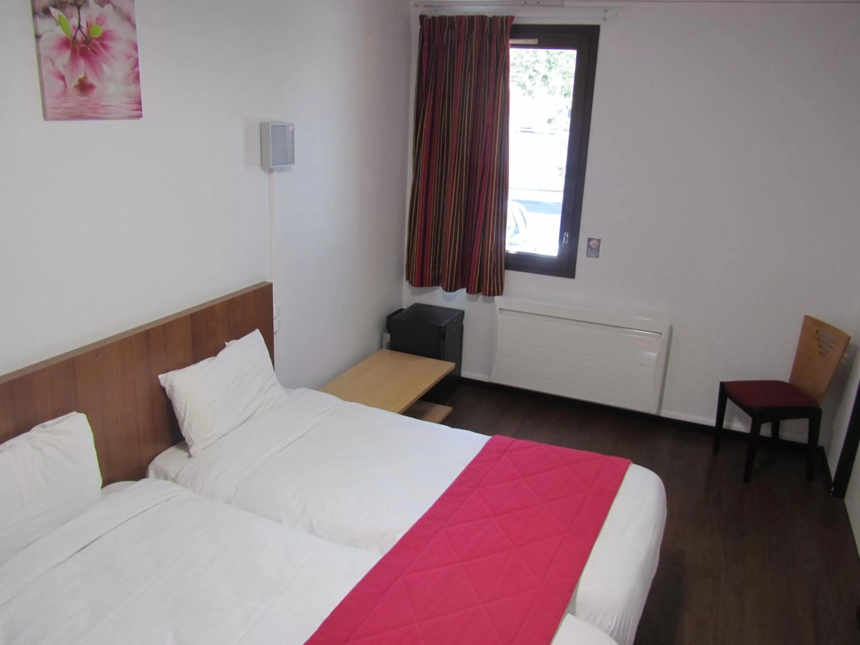 Photo of the whole room, Bed in Hôtel Le Saint Joseph