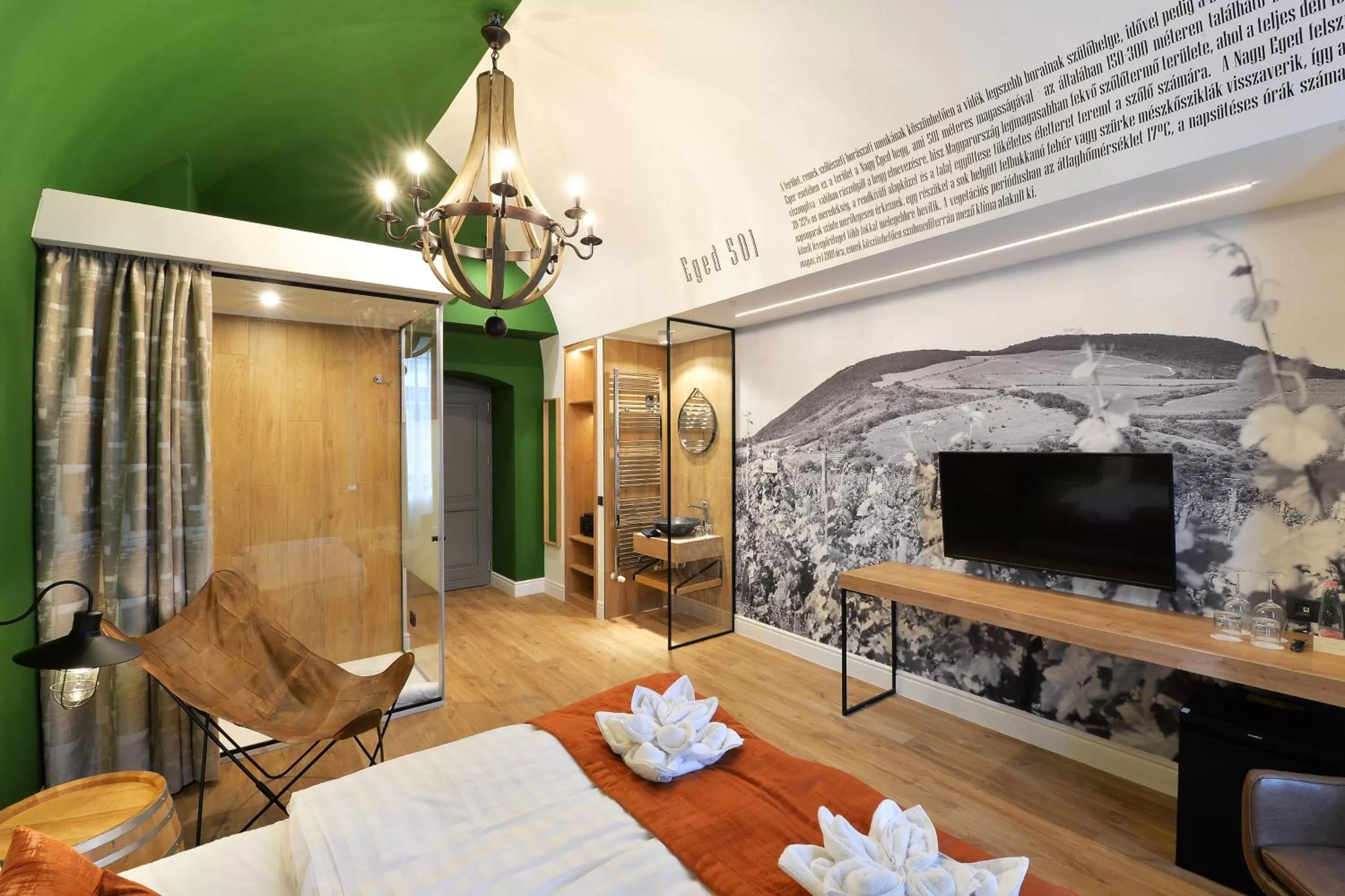 Photo of the whole room, TV/Entertainment Center in 1552 Boutique Hotel