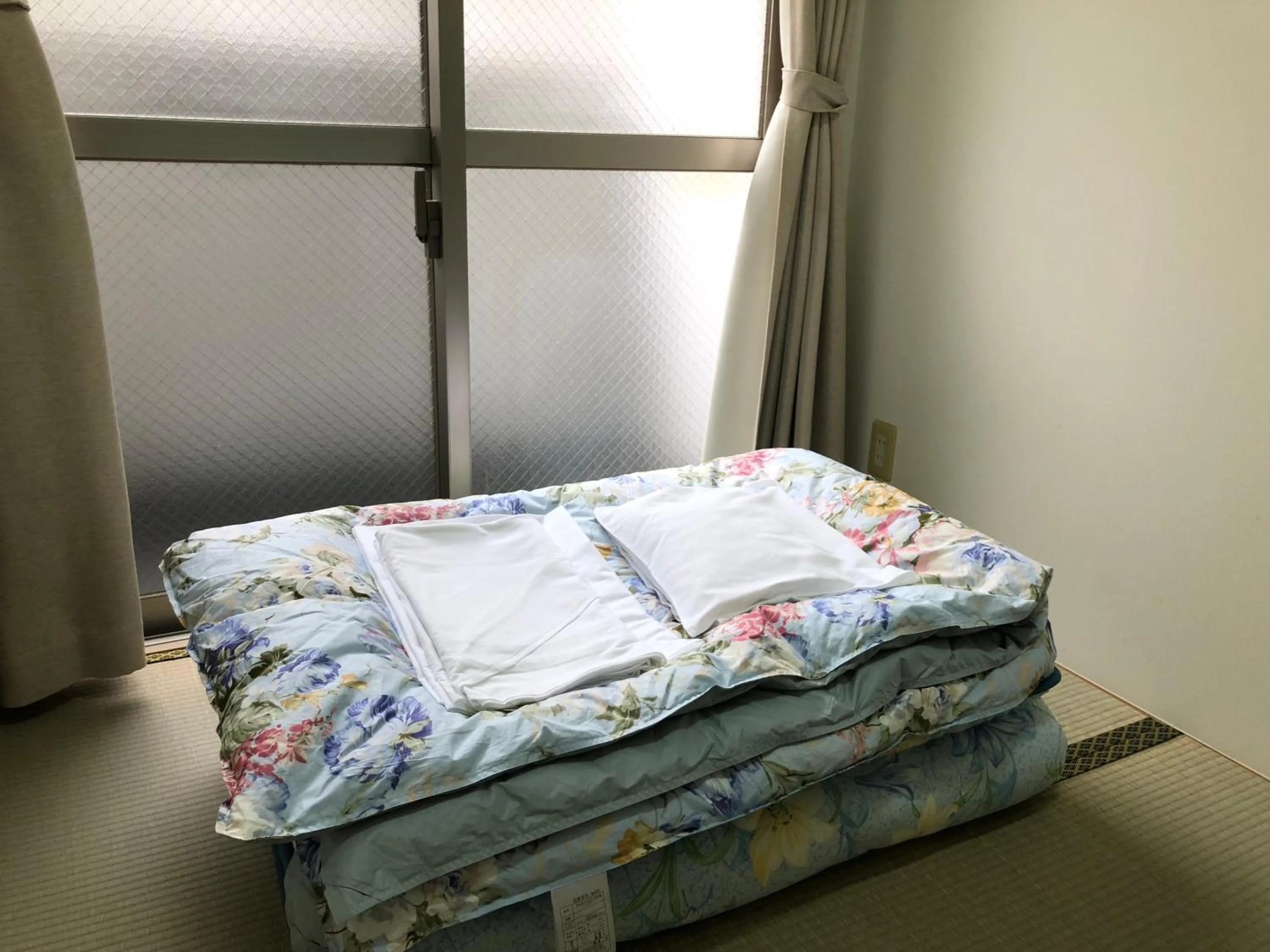 Bed in Hotel Mirai