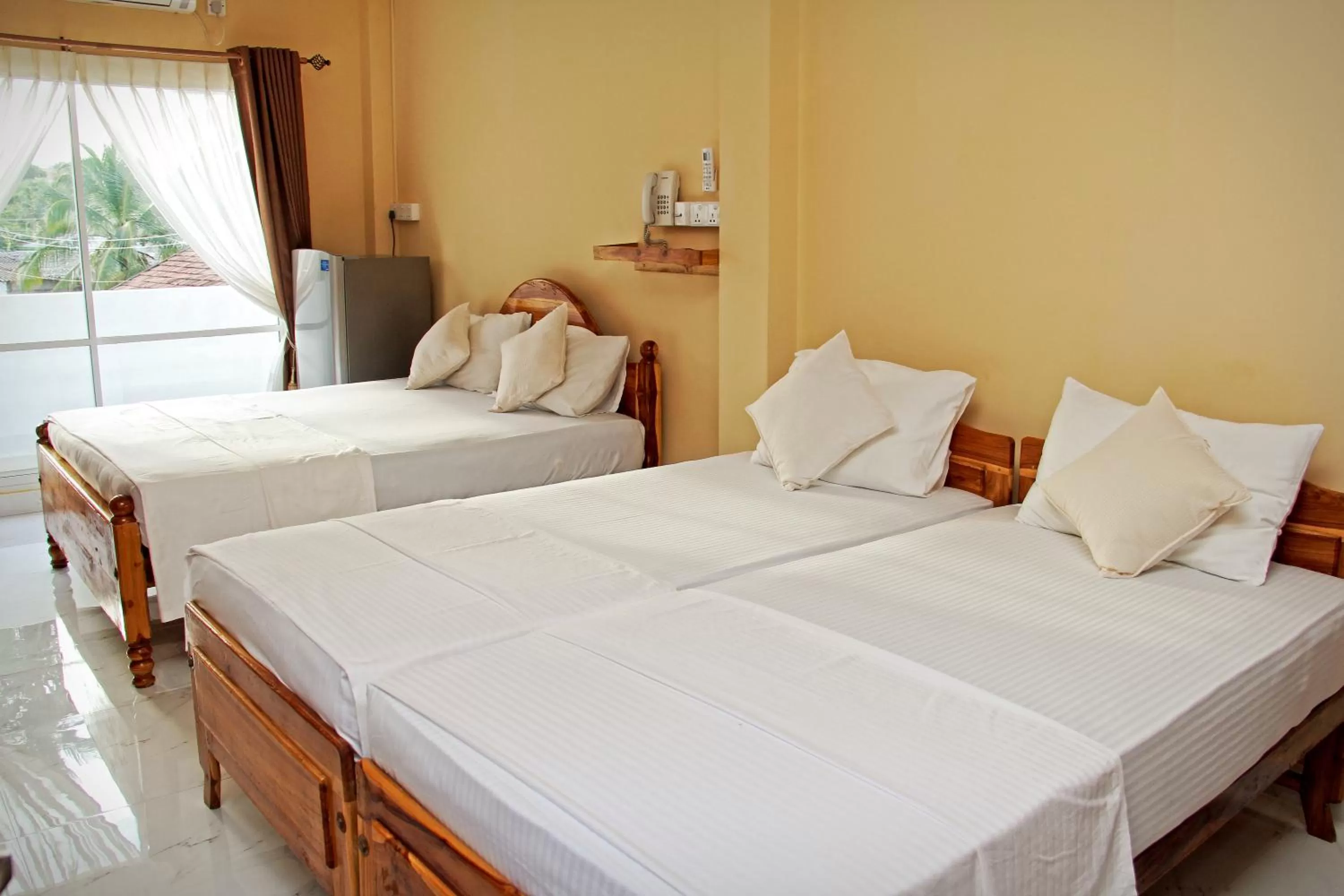 Photo of the whole room, Bed in Bluewater Beach Resort