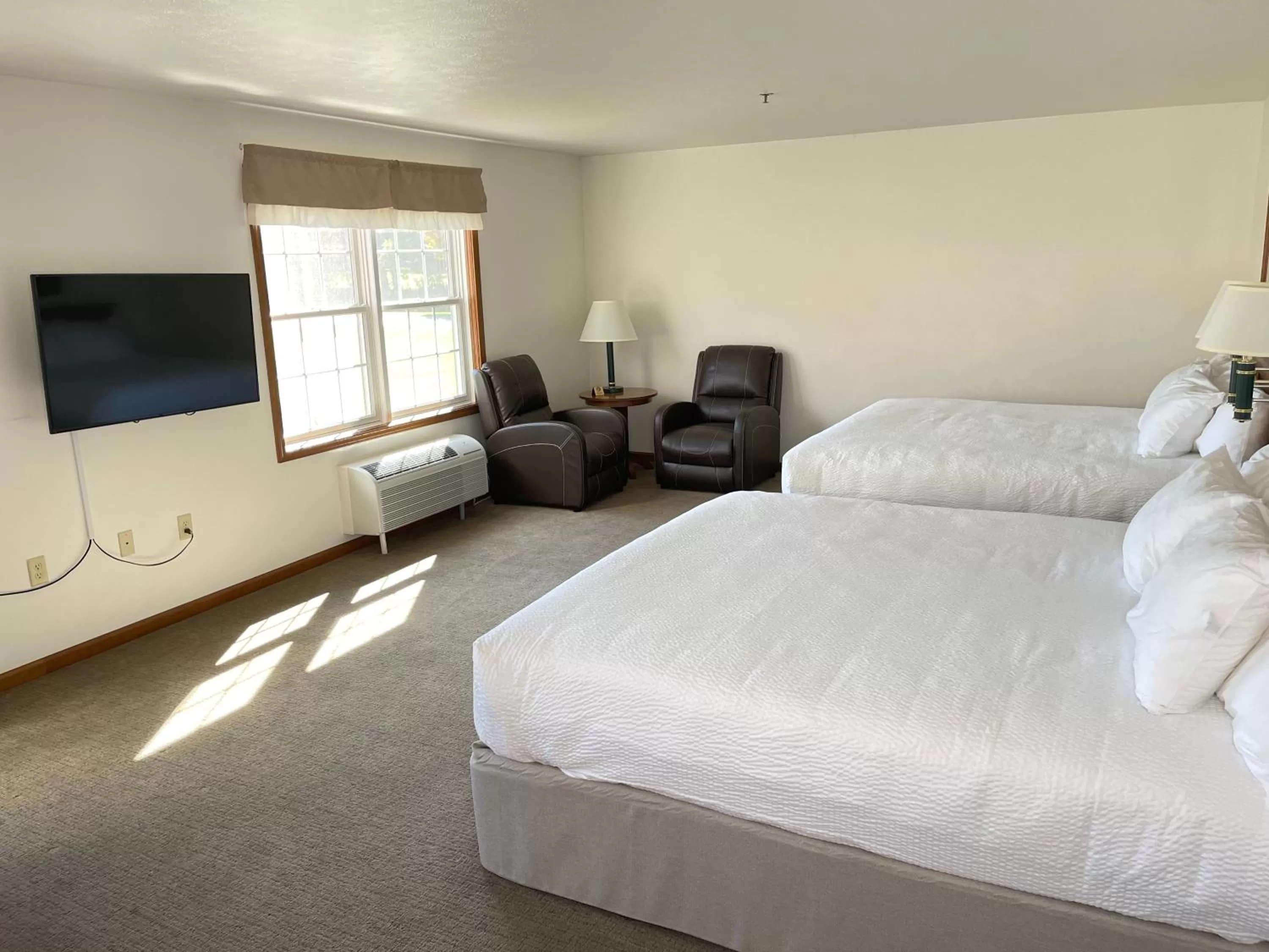 Bed in Farmstead Inn and Conference Center