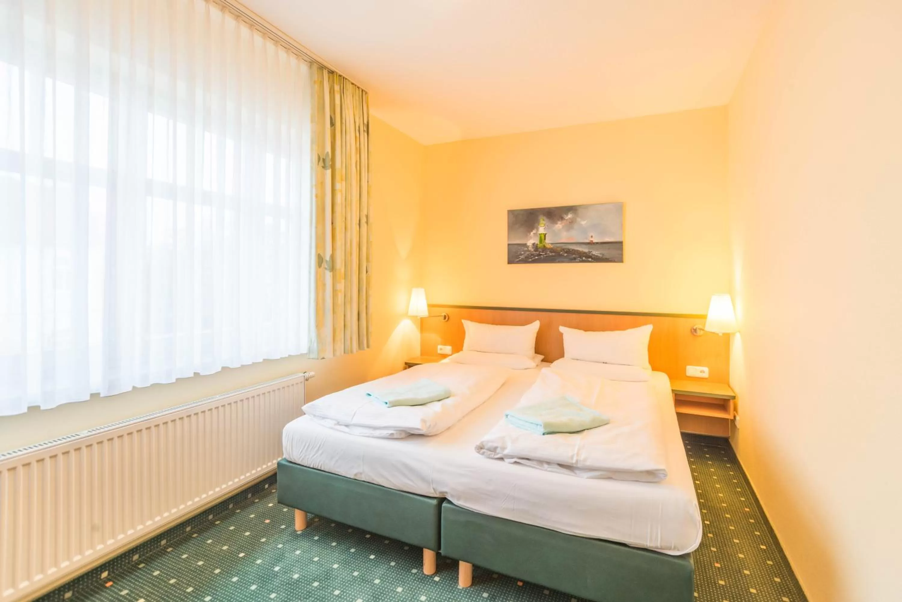 Photo of the whole room, Bed in Am Weststrand Aparthotel Kühlungsborn