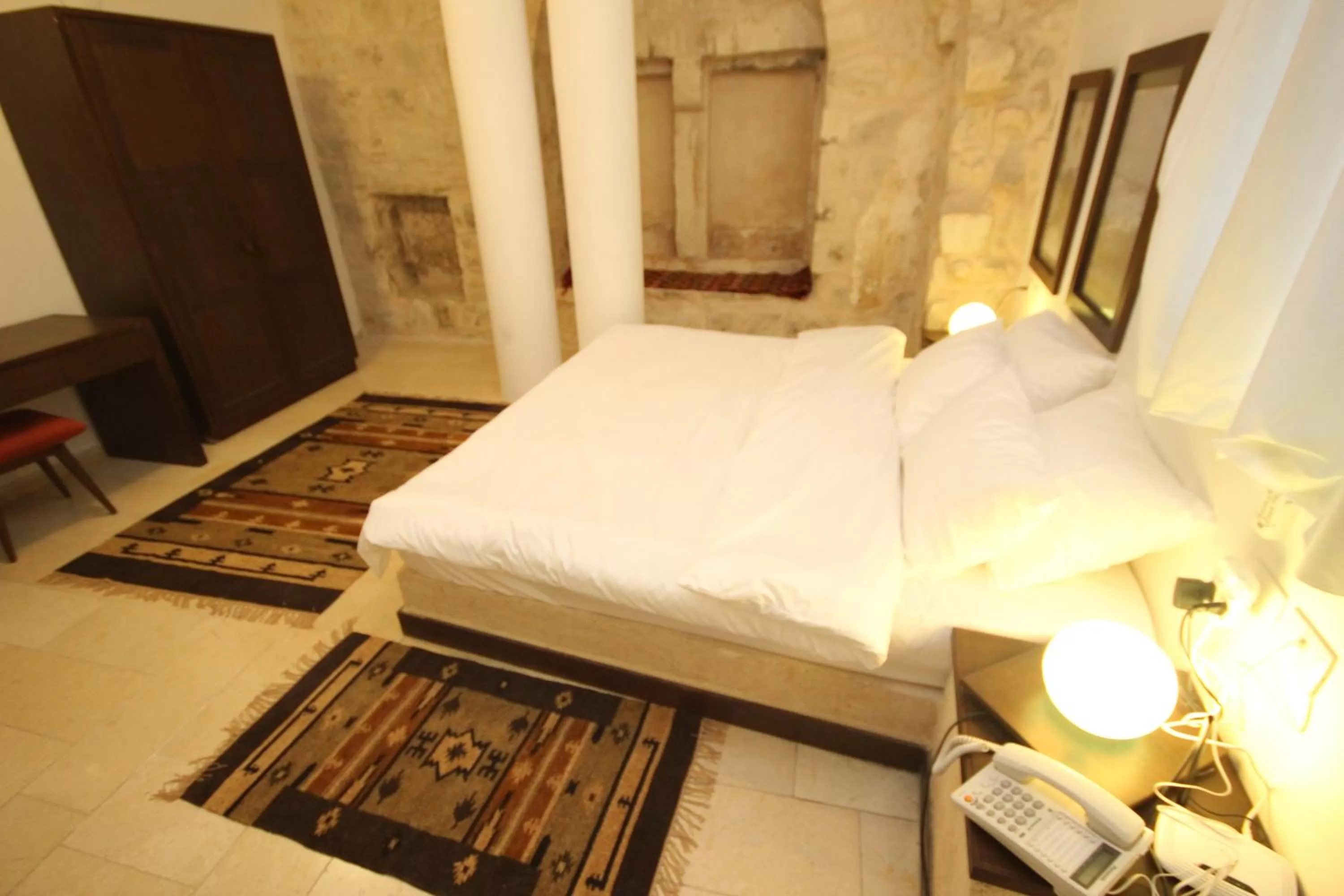 Bed in Khan Alwakala Hotel
