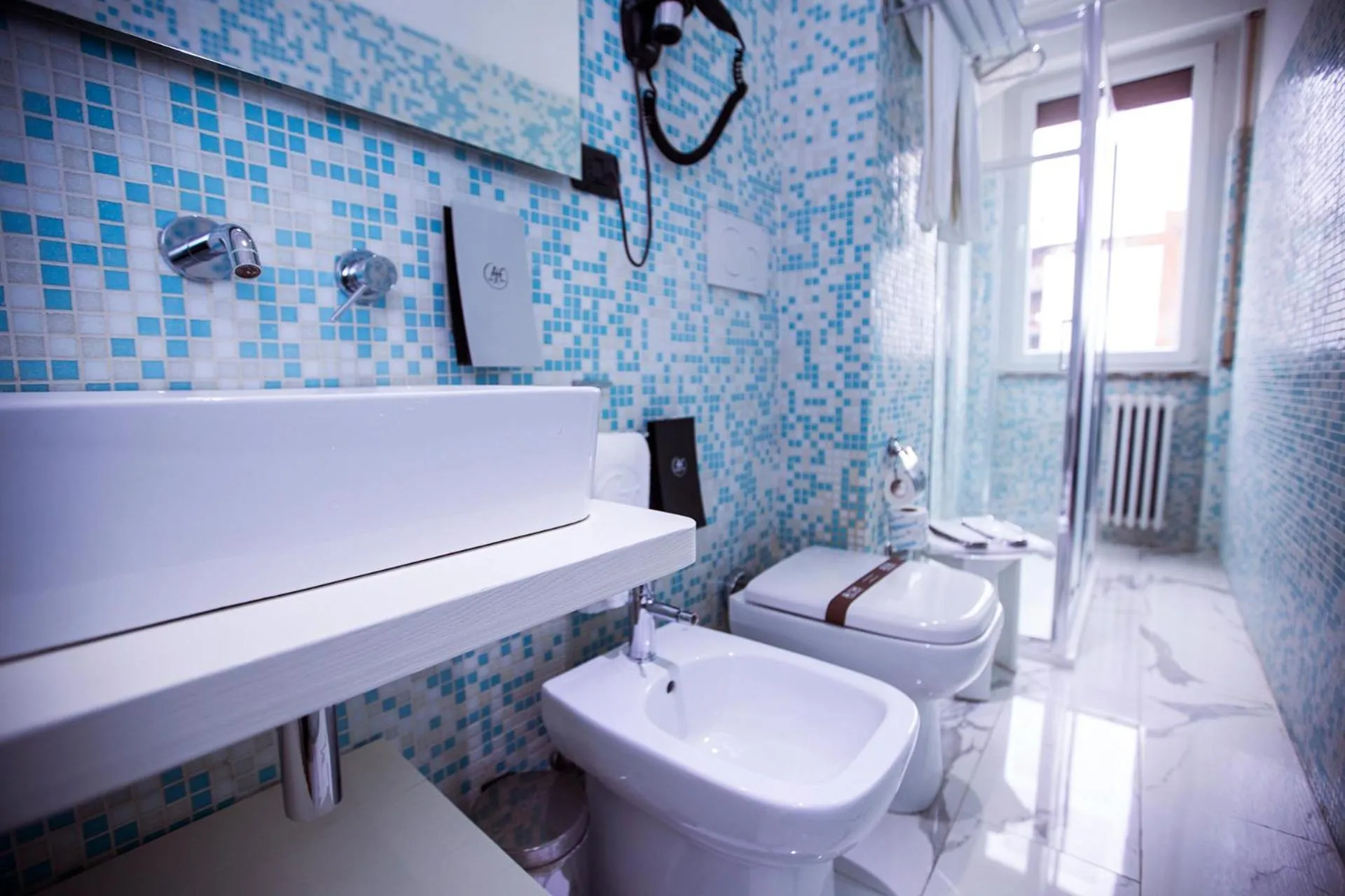 Bathroom in Agape Hotel - AA Hotels