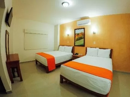 Bedroom, Bed in Gran Hotel Residencial Galerias