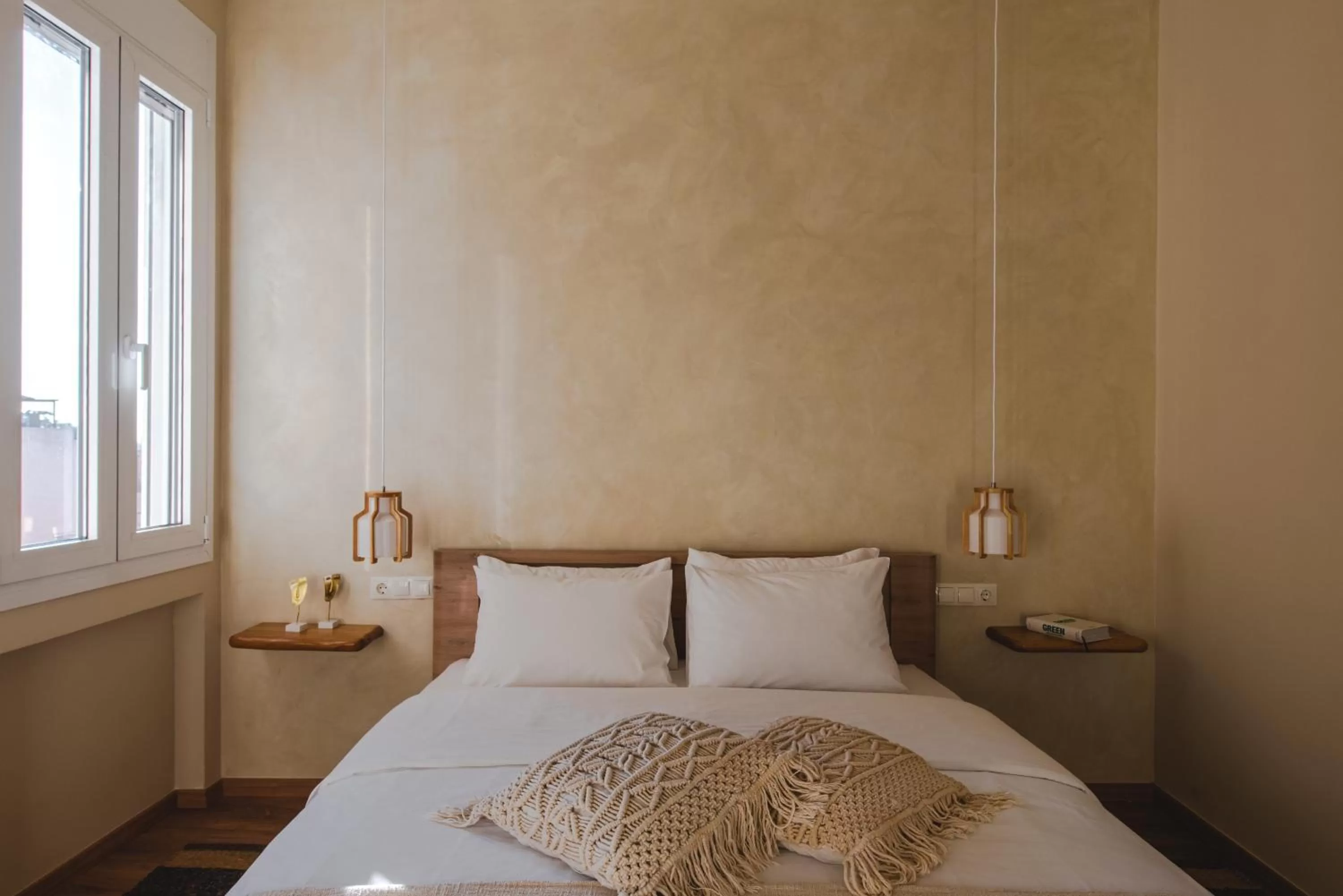 Bed in Living Stone Aparthotel