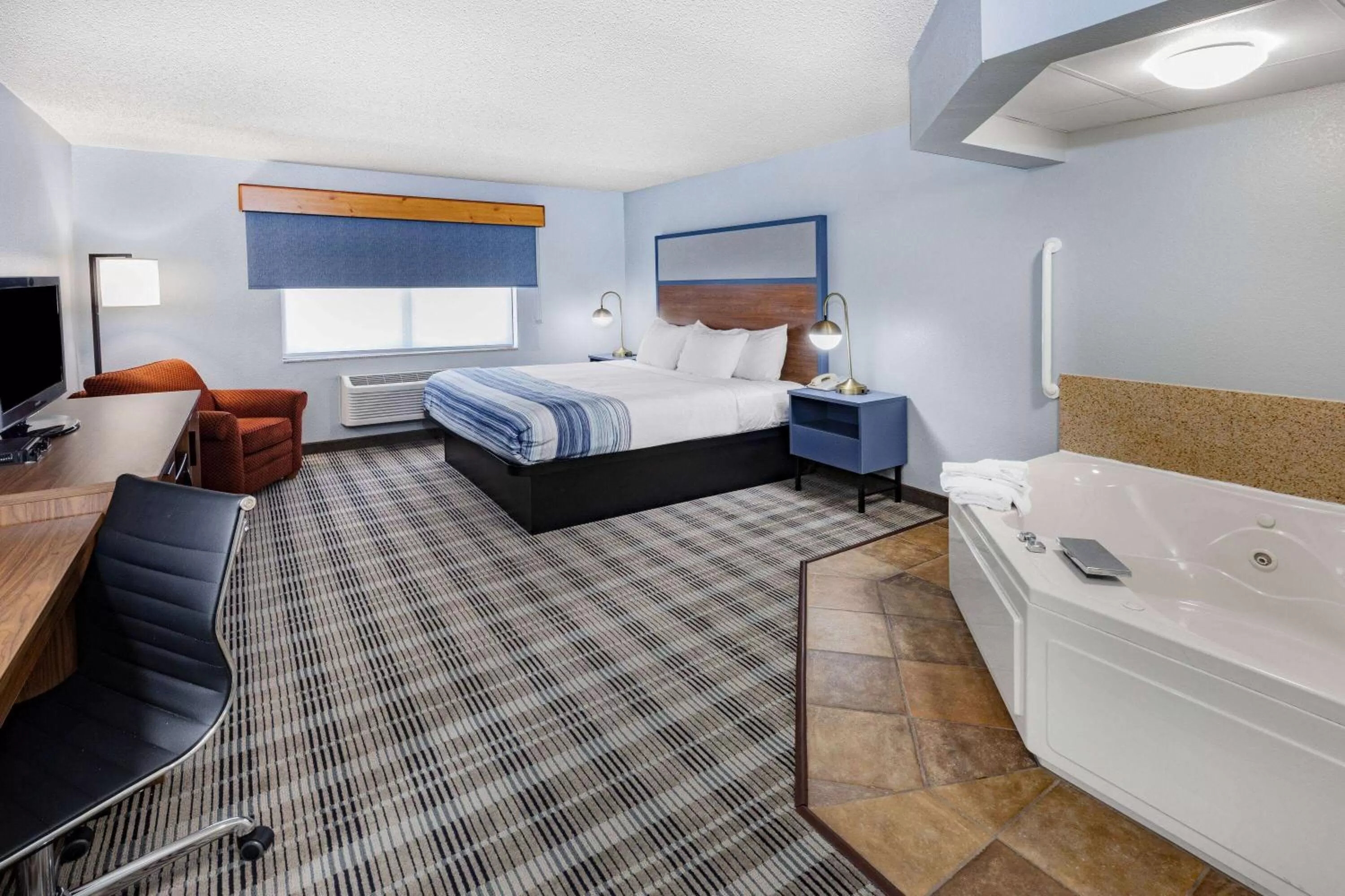 Photo of the whole room, Bed in AmericInn by Wyndham Sayre