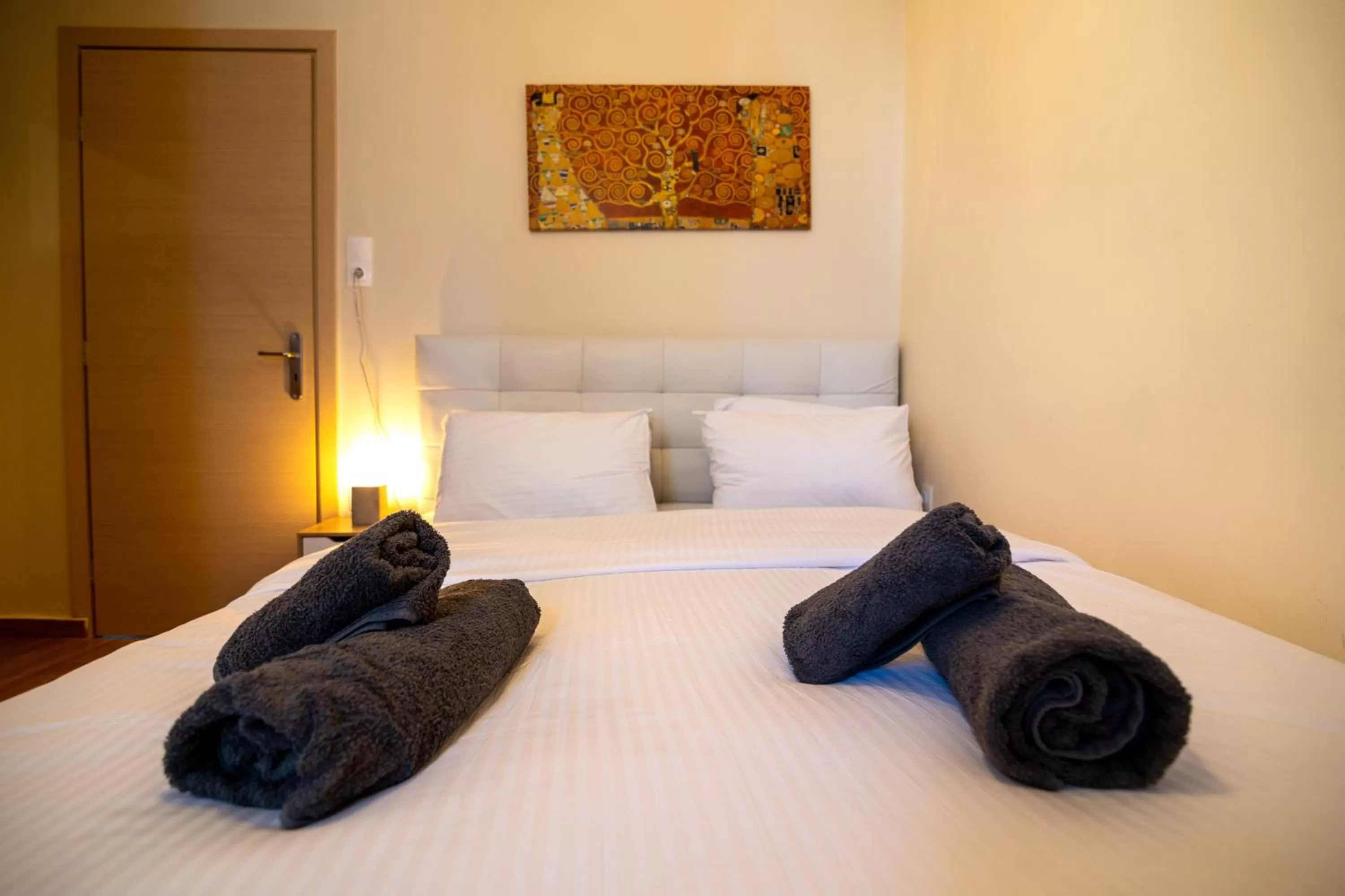 Bed in Votsalakia Hotel & Luxury Apartments