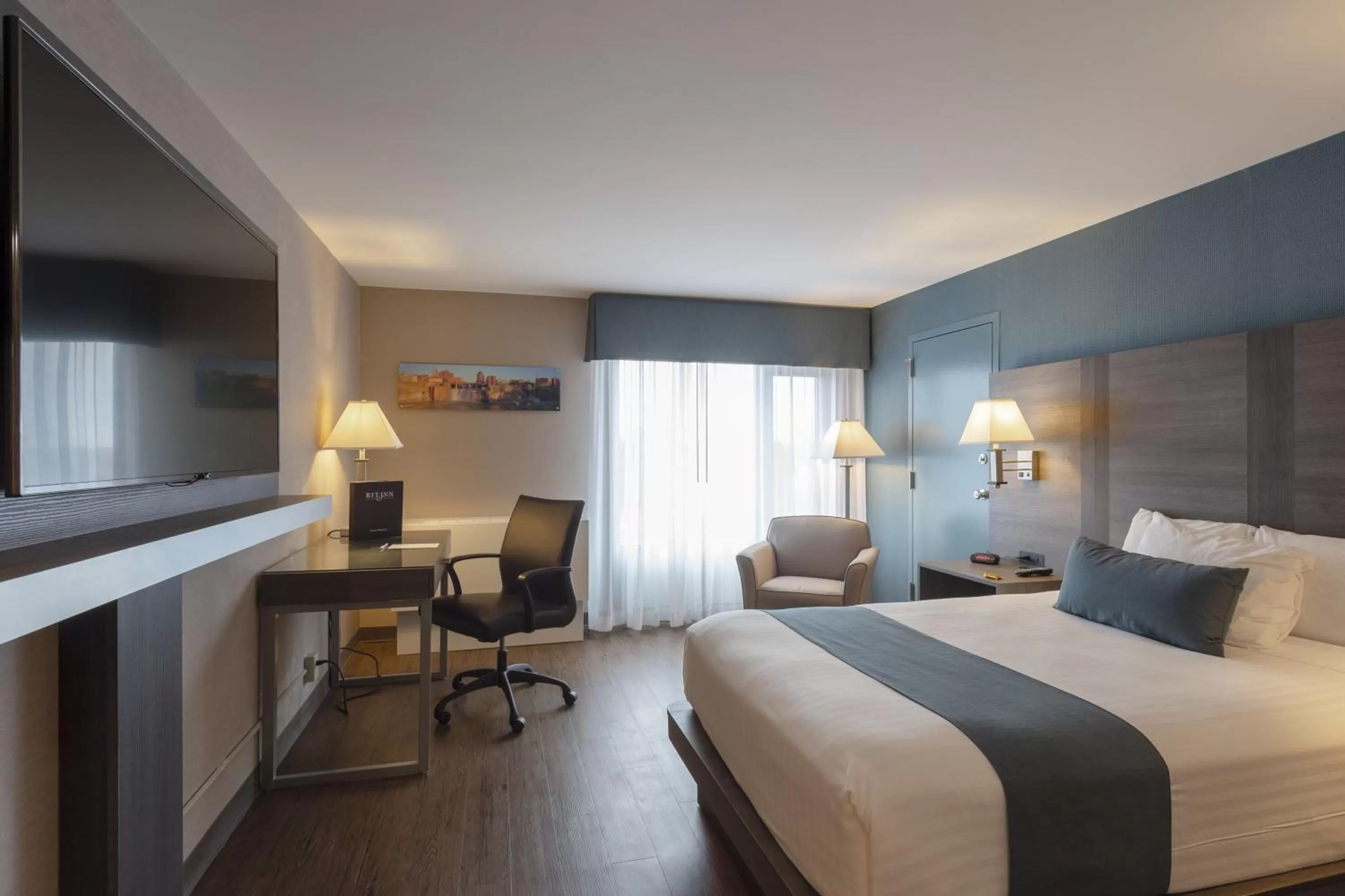 Bed in RIT Inn & Conference Center