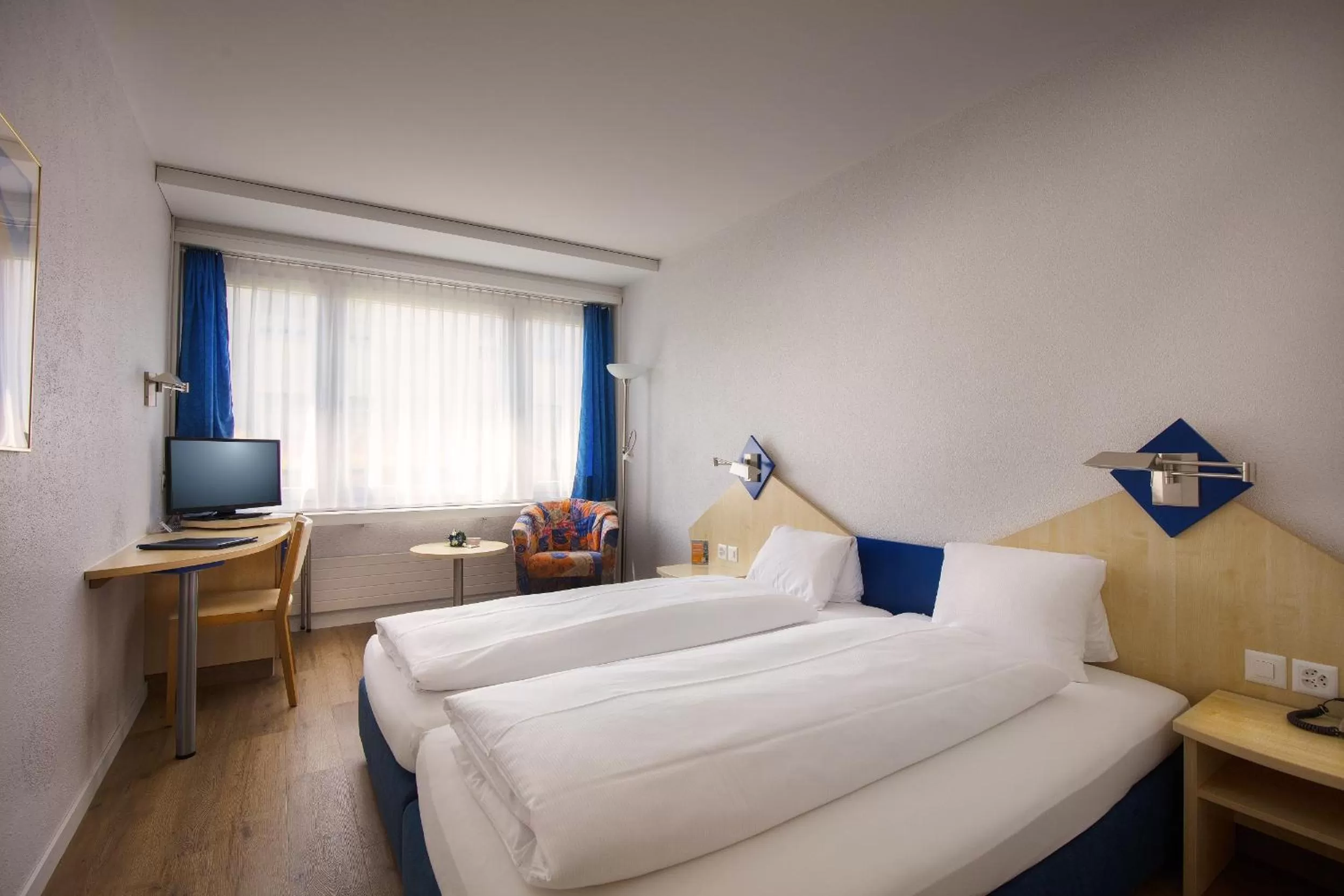 Bed in Hotel Blumenstein Self-Check In