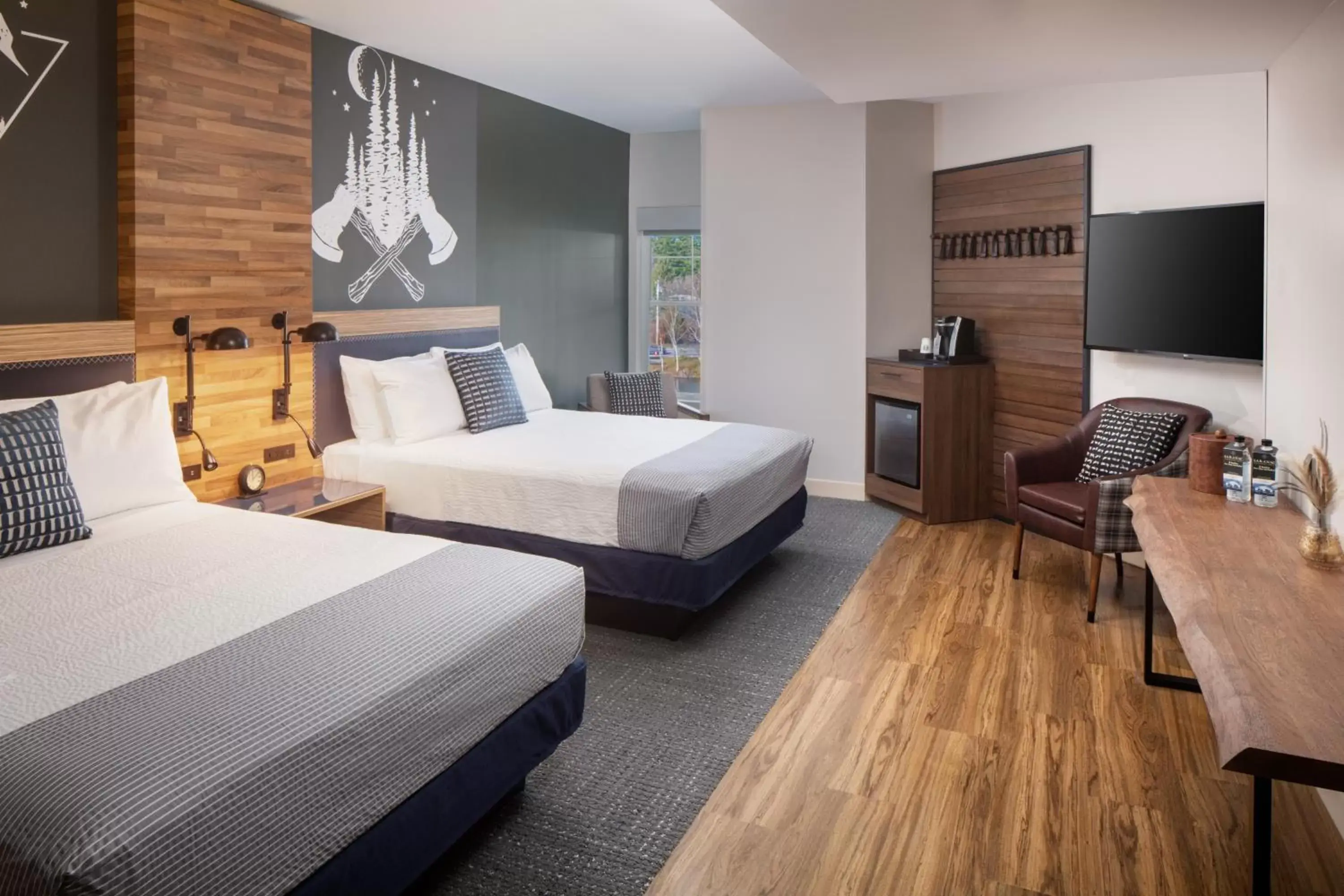 Quadruple Queen Room with Bath Tub and Town View - Mobility/Hearing Accessible in voco Saranac Lake NY - Waterfront by IHG Quadruple Queen Room with Bath Tub and Town View - Mobility/Hearing Accessible in voco Saranac Lake NY - Waterfront by IHG