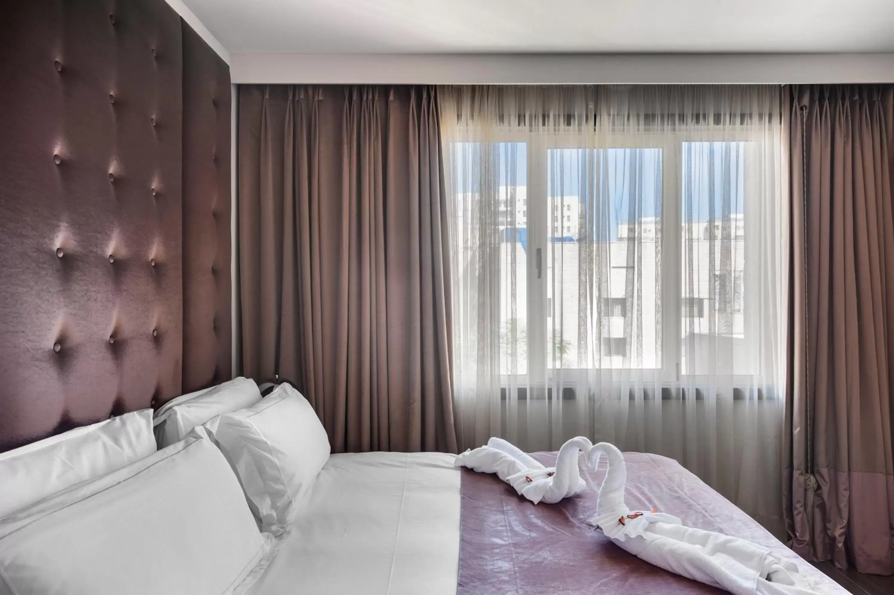 Deluxe Junior Suite With Balcony in Lady Stern Jerusalem Hotel Deluxe Junior Suite With Balcony in Lady Stern Jerusalem Hotel