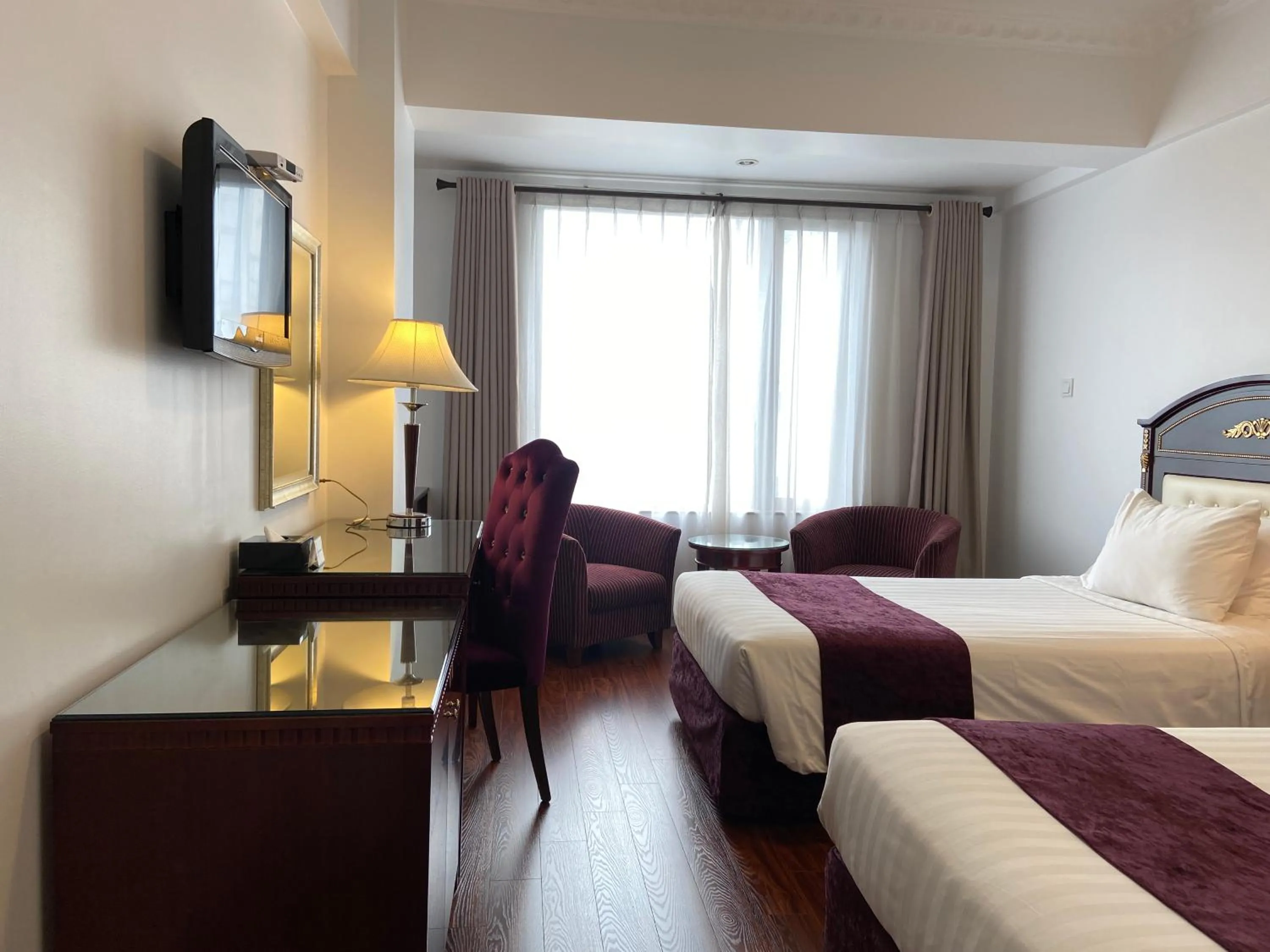 Bed in Flower Garden Hotel