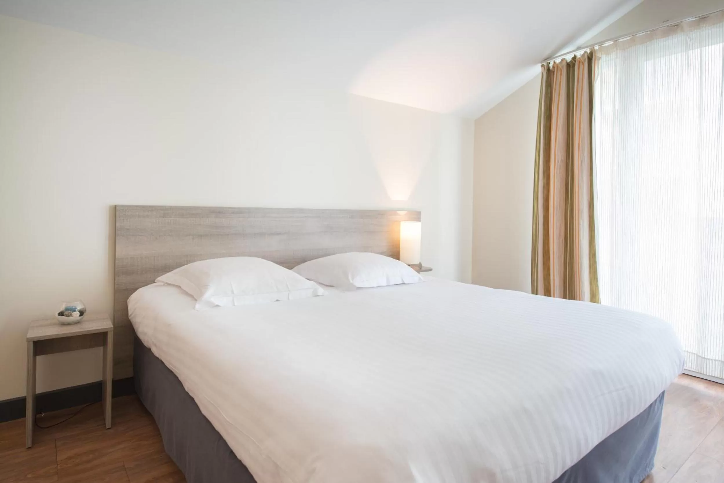 Bed in Comfort Aparthotel Saint-Nazaire Les Portes de l Ocean