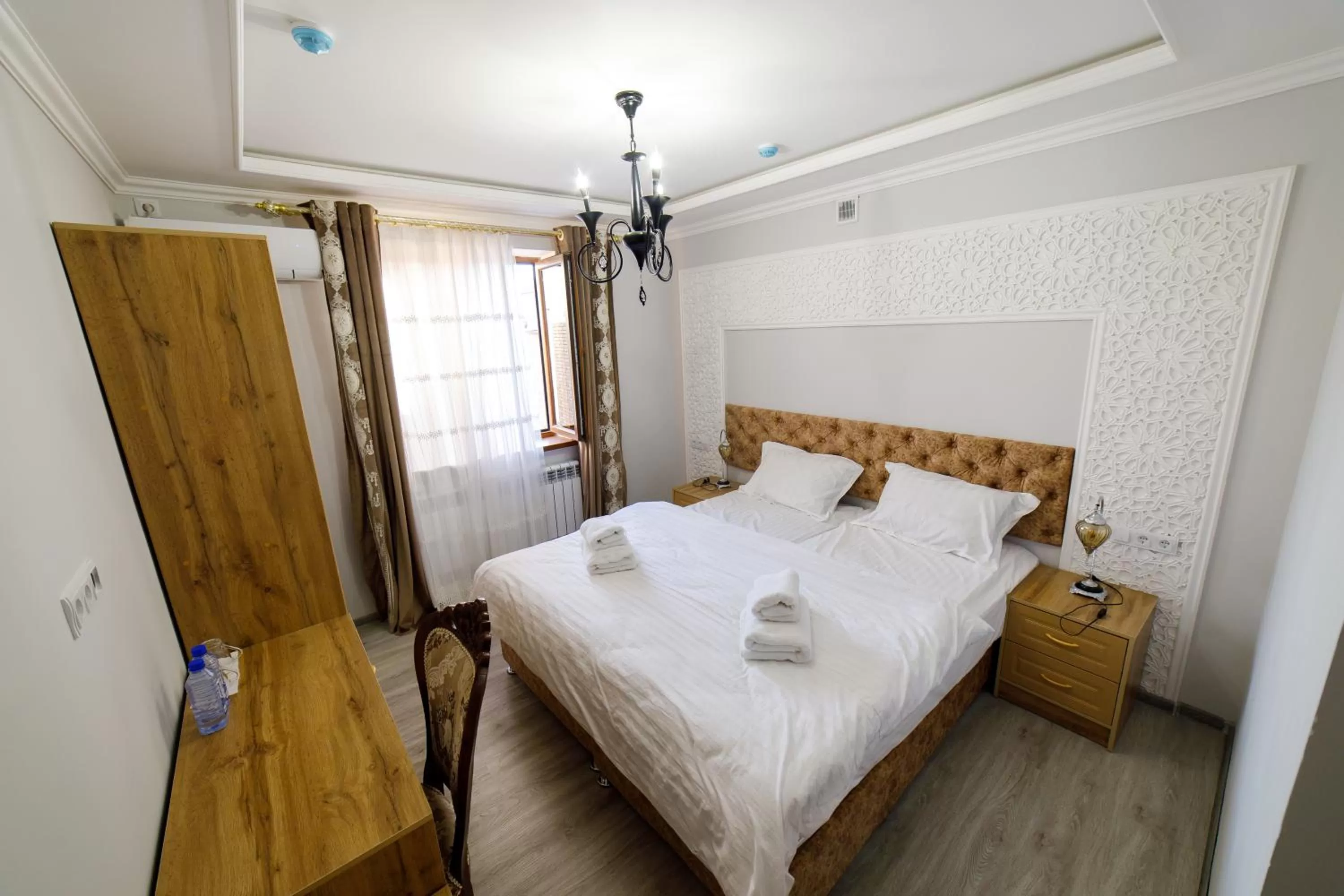 Bed in Khans Palace Hotel