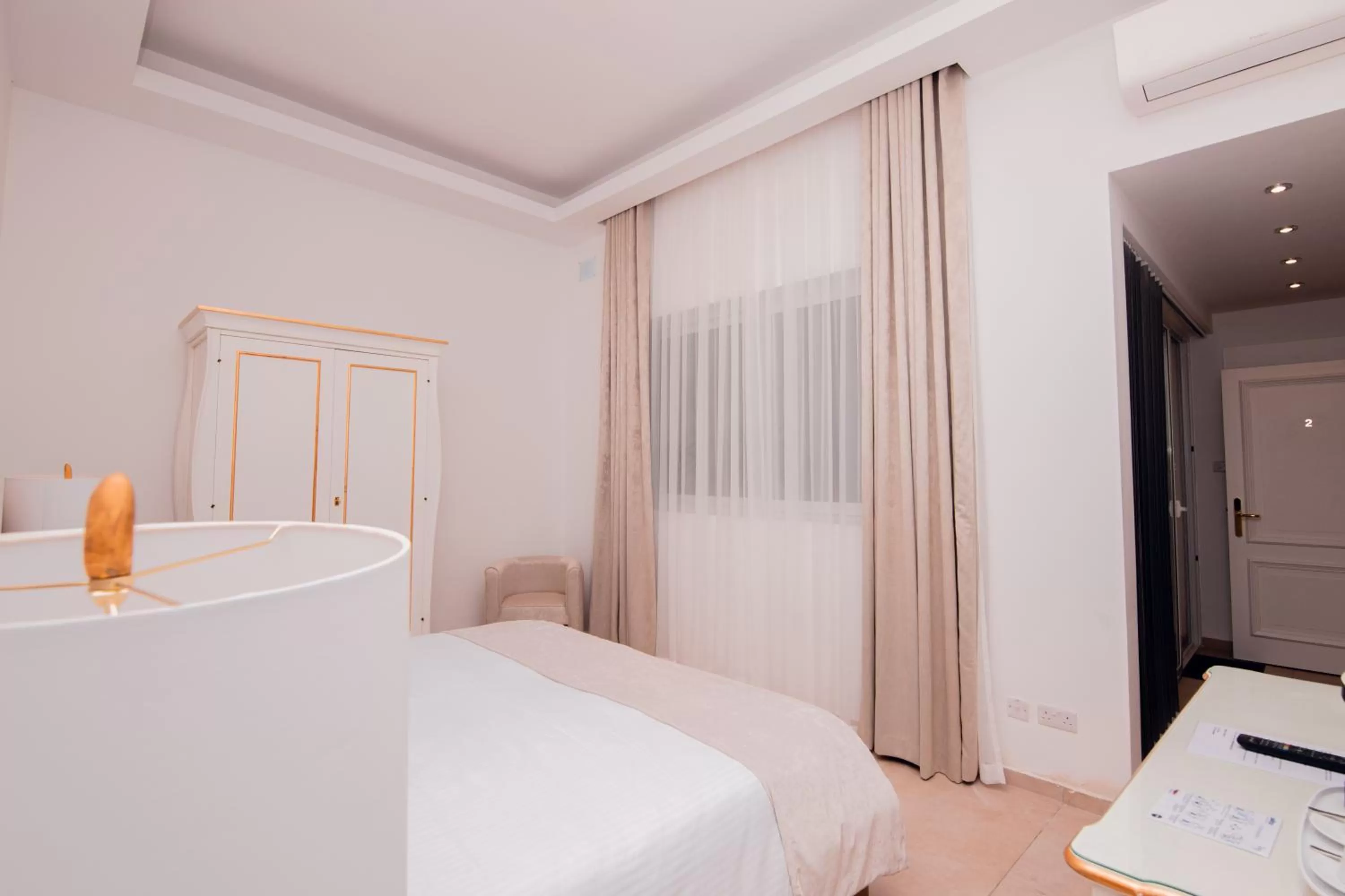 Bed in Giorgio Boutique Hotel