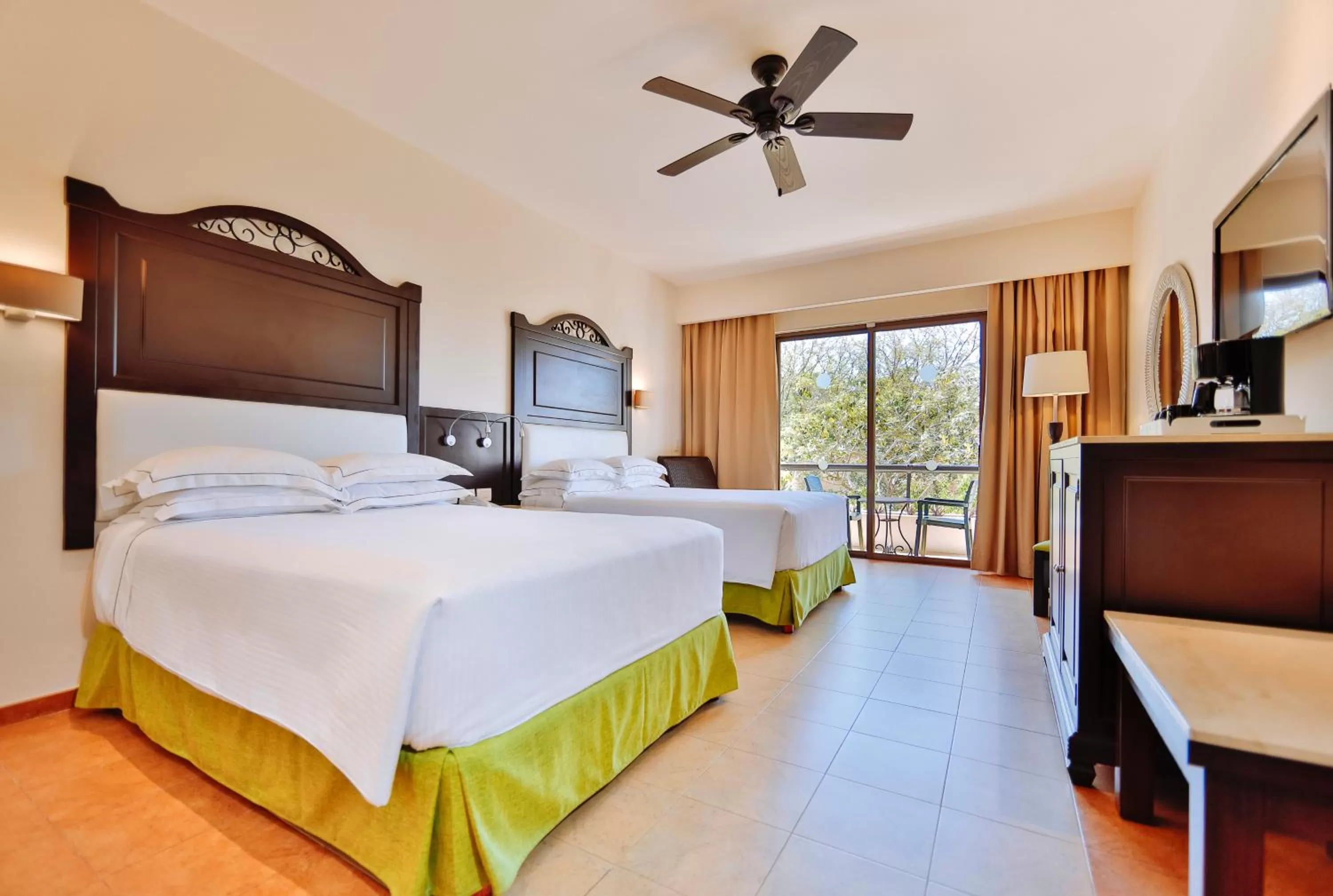 Balcony/Terrace, Bed in Occidental at Xcaret Destination - All Inclusive