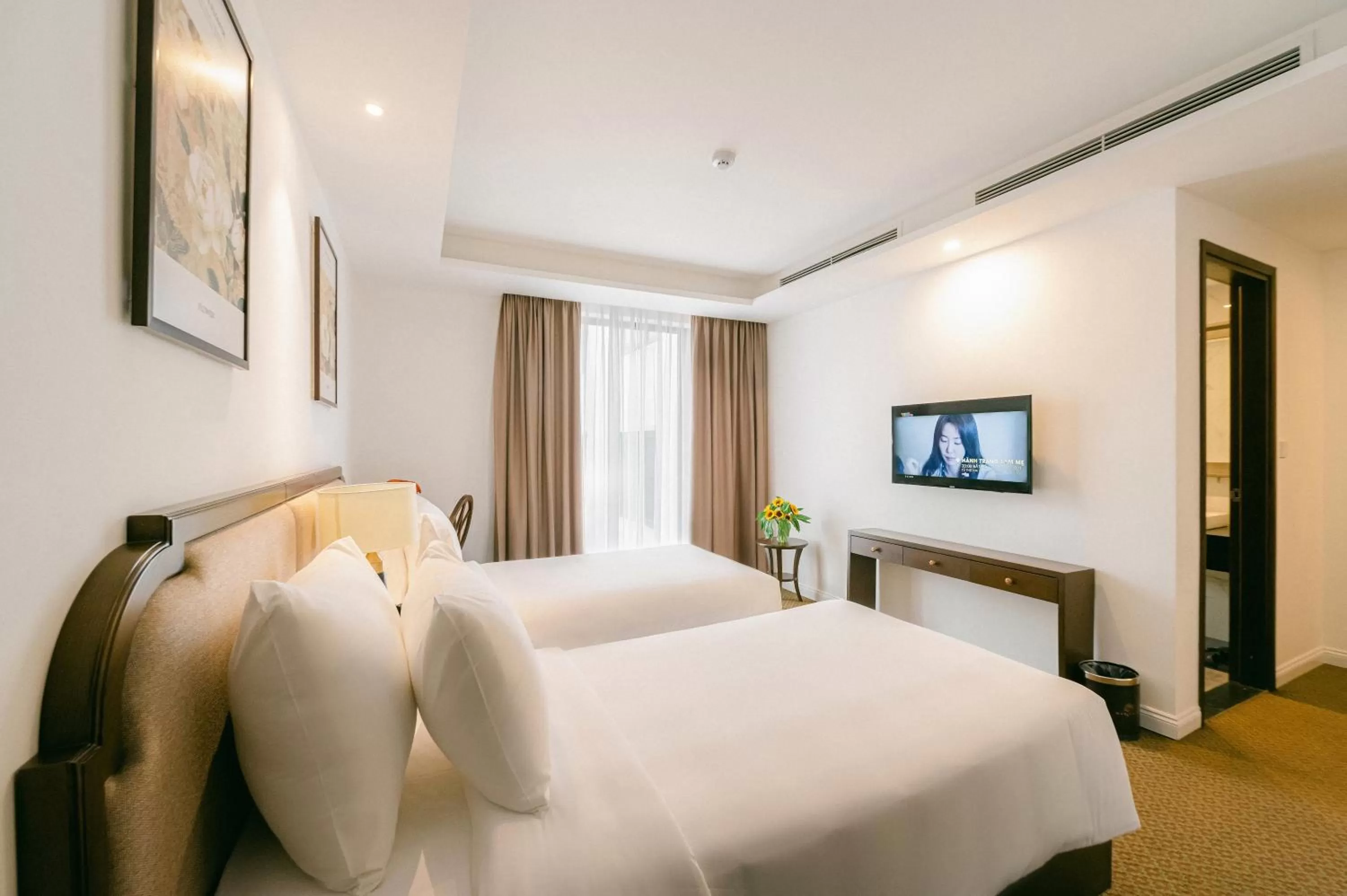 Photo of the whole room, Bed in Marigold Hotel Hanoi