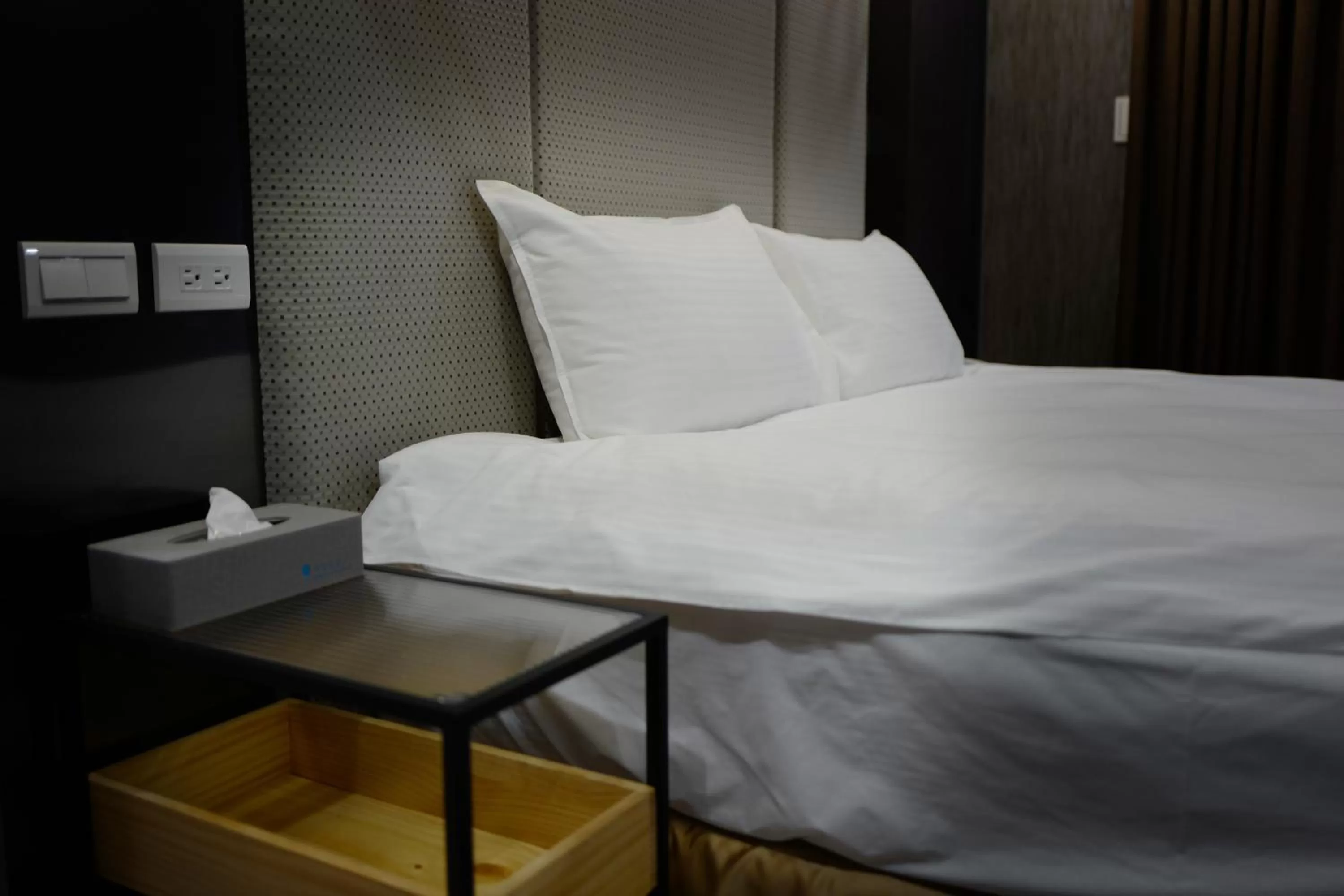 Bed in Comma Boutique Hotel