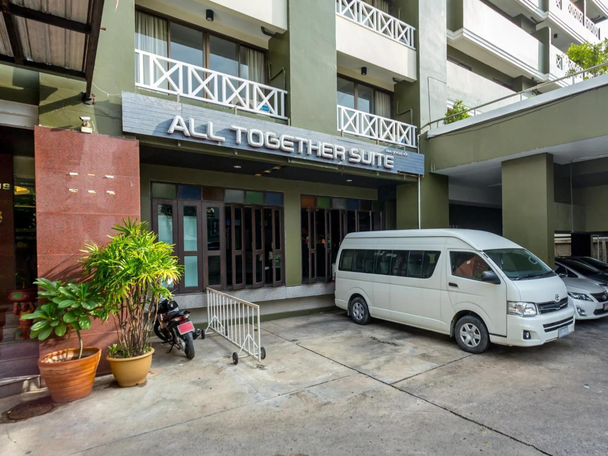 Property building in All Together Suite Hotel