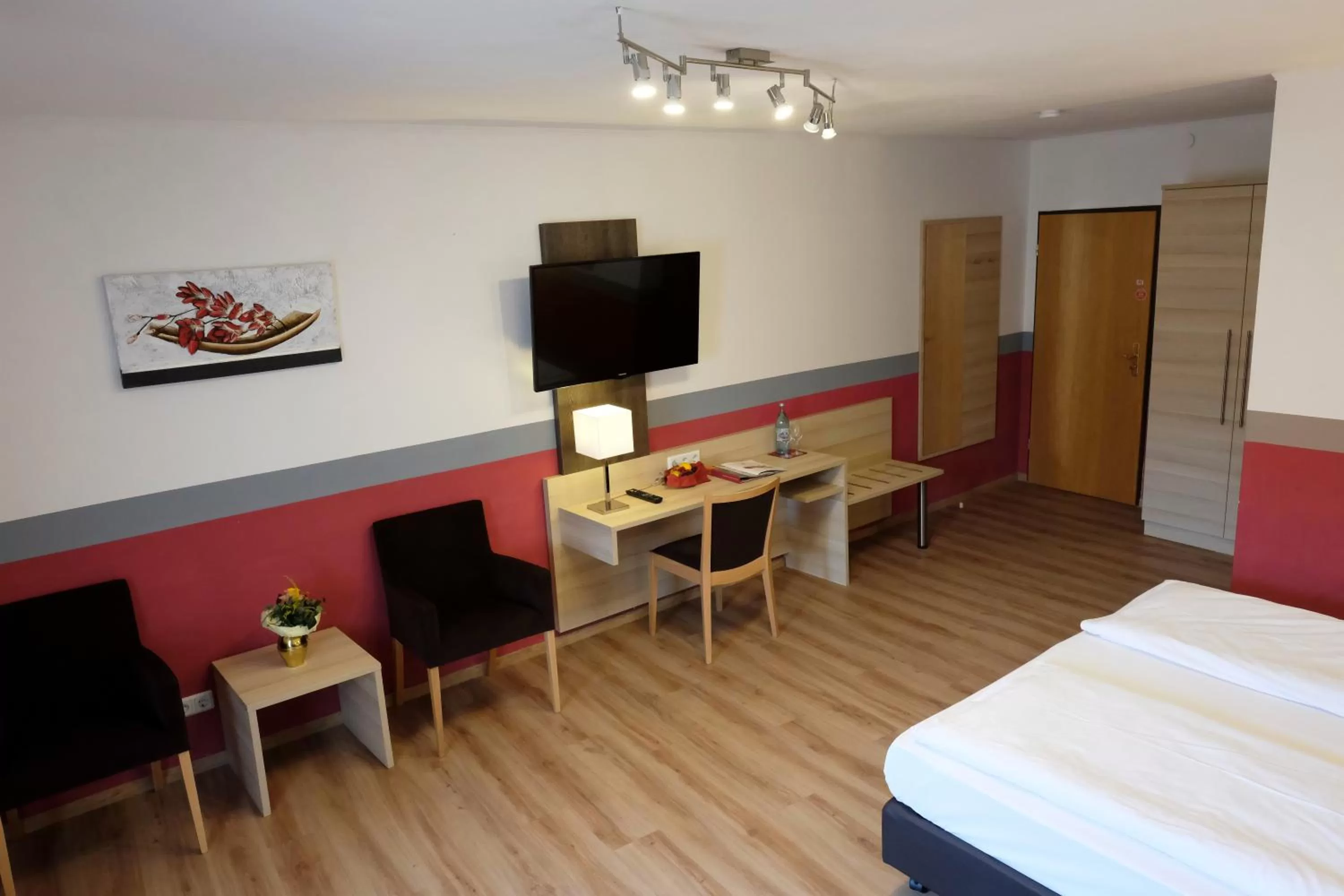 Seating area, Bed in Romantica Hotel Blauer Hecht