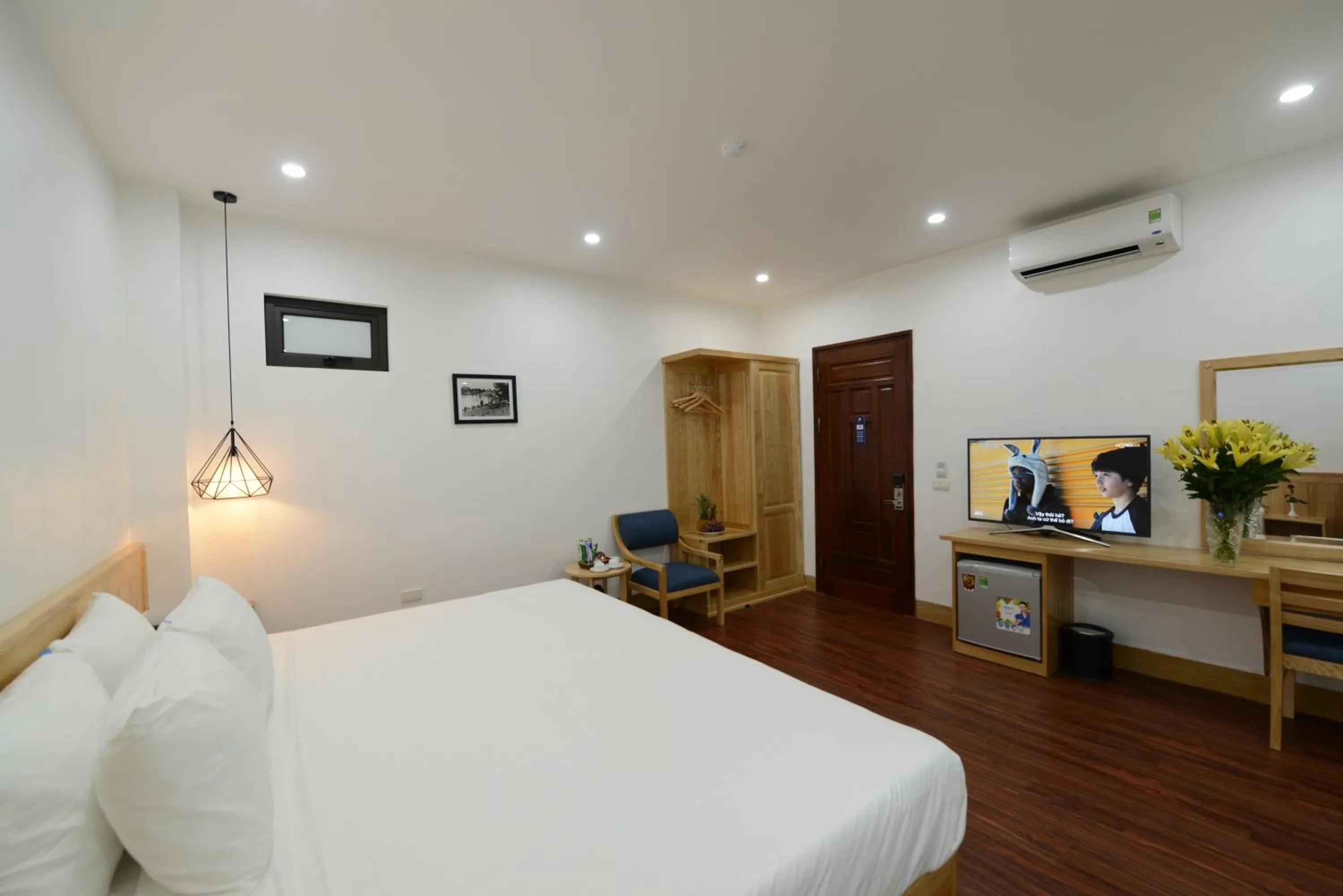 Bed in Blue Hanoi Inn City Hotel