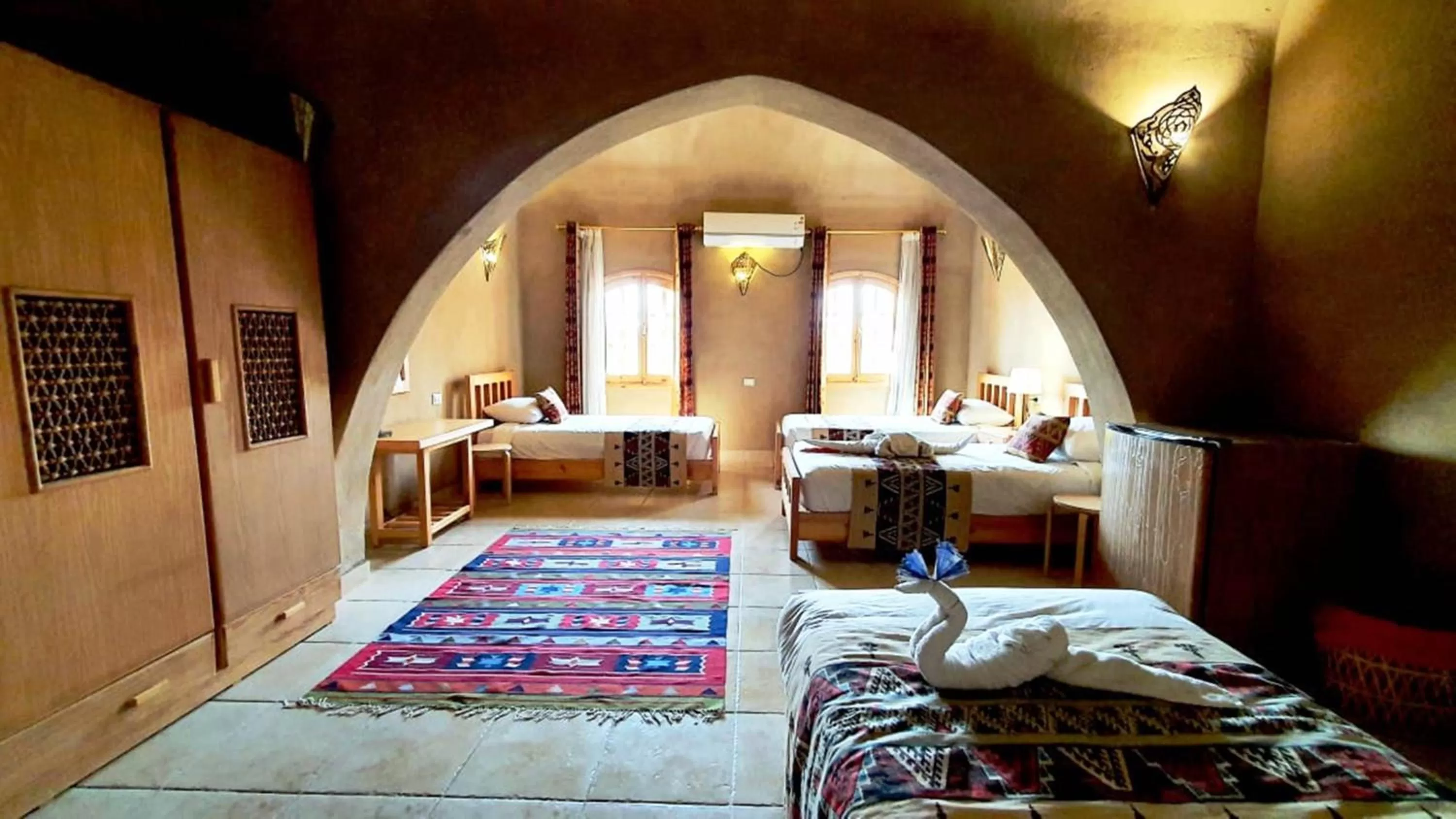 Bed in Embrace Hotel