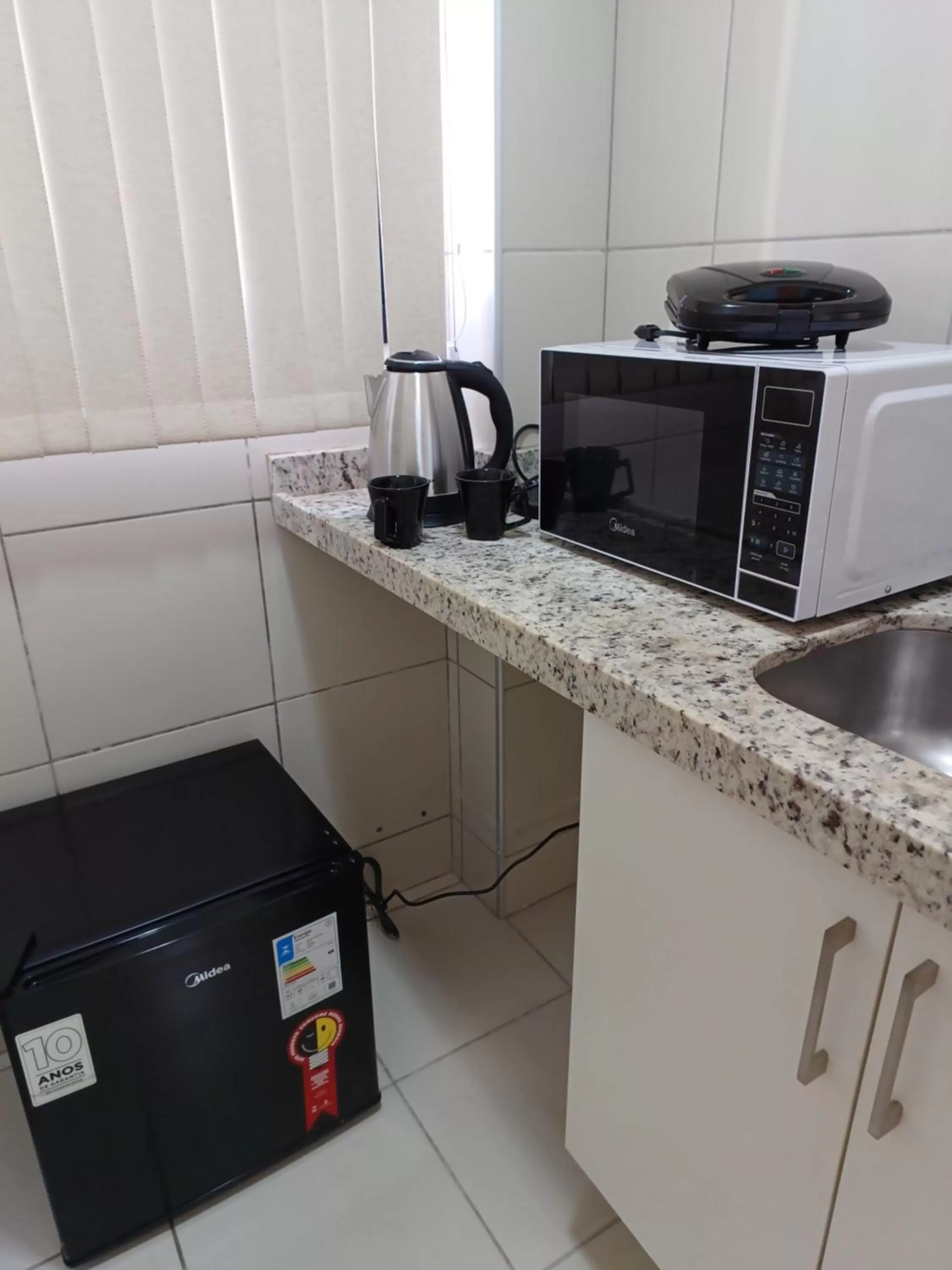 minibar, Kitchen/Kitchenette in Ponta Negra Flat Confort 18 Andar