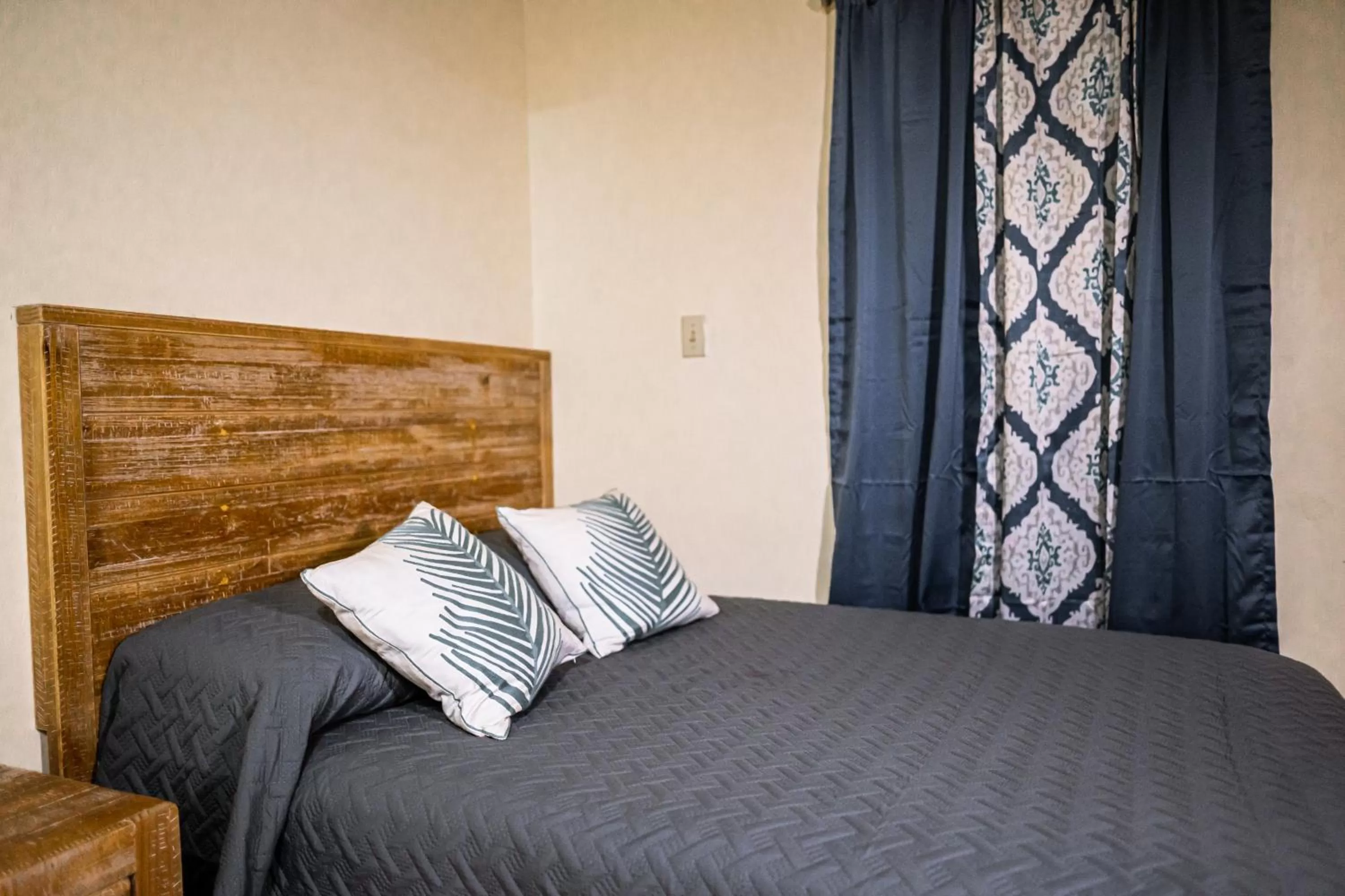 Bed in Connie's Comfort Suites