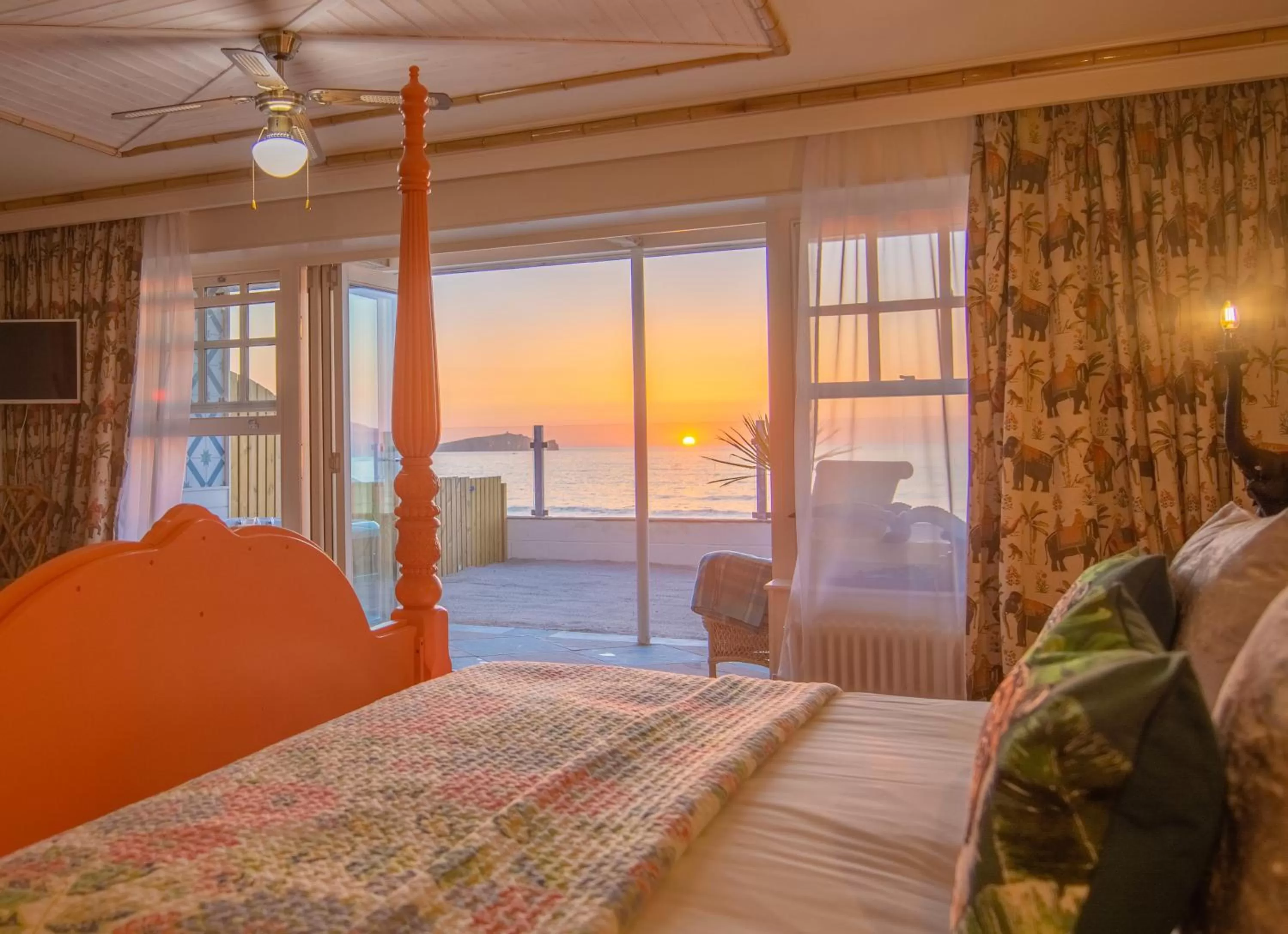 Seating area, Bed in Tolcarne Beach Colonial Restaurant and Rooms