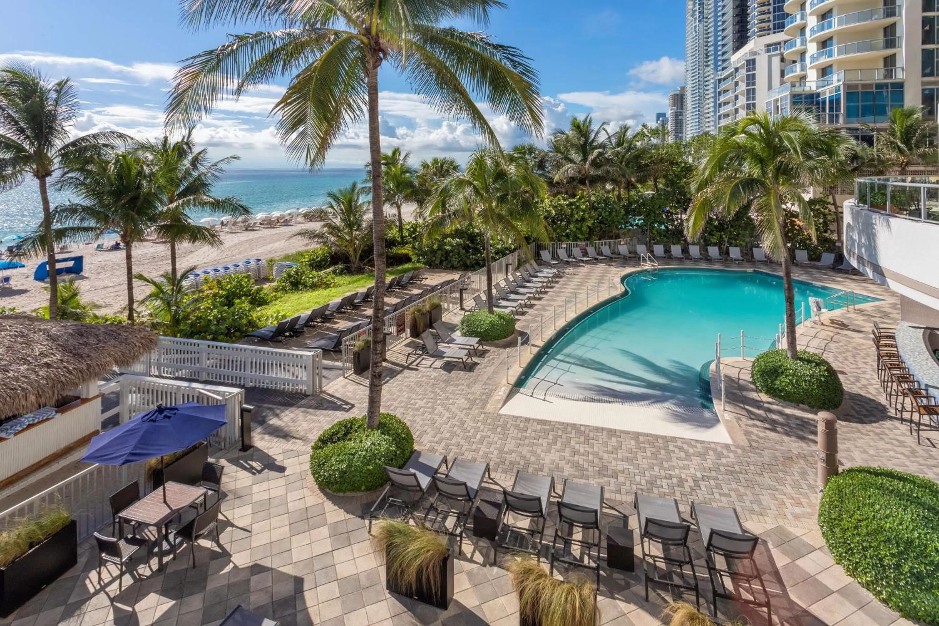 Pool view in DoubleTree by Hilton Ocean Point Resort - North Miami Beach