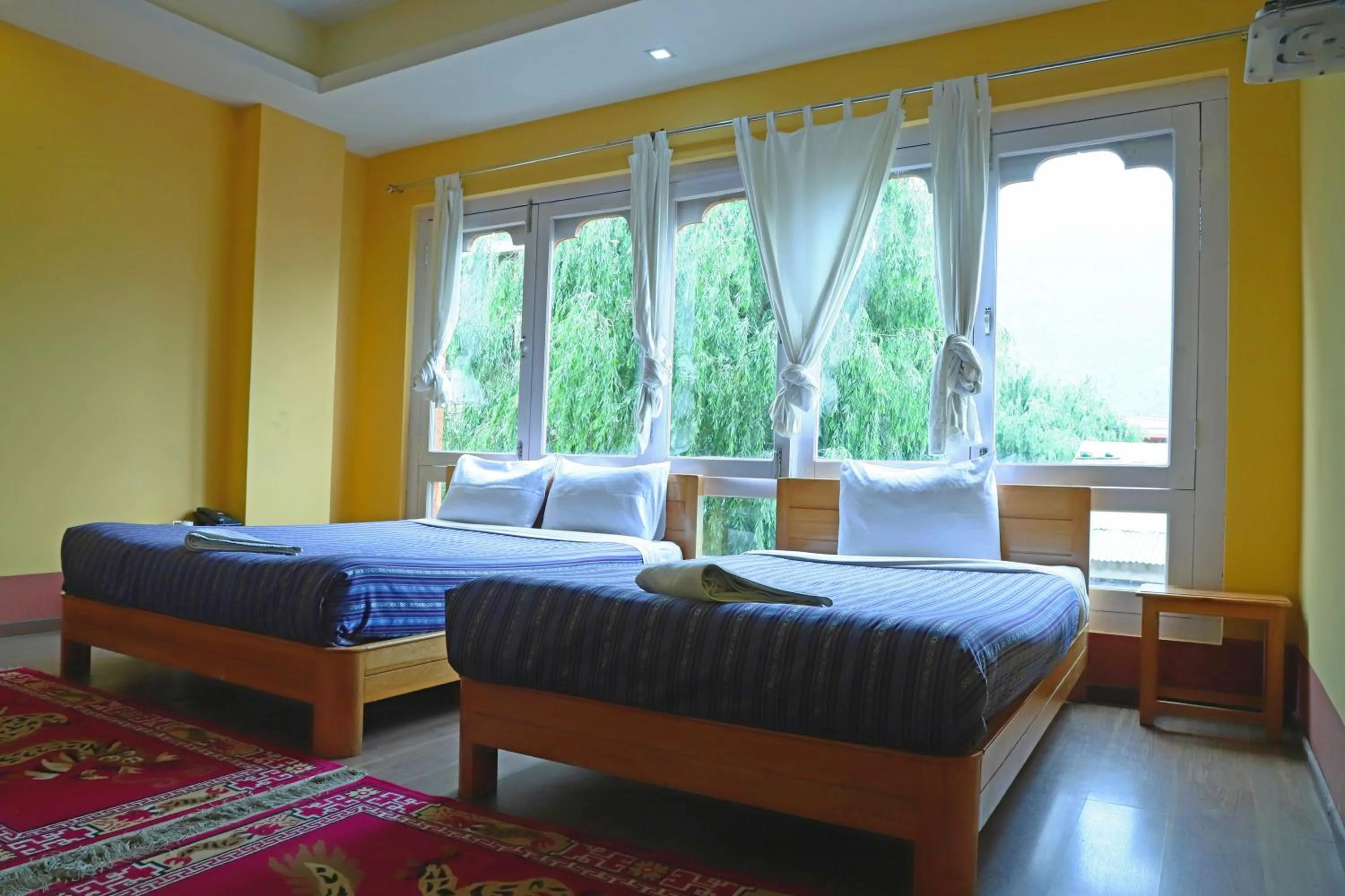 Bed in Hotel Thimphu City