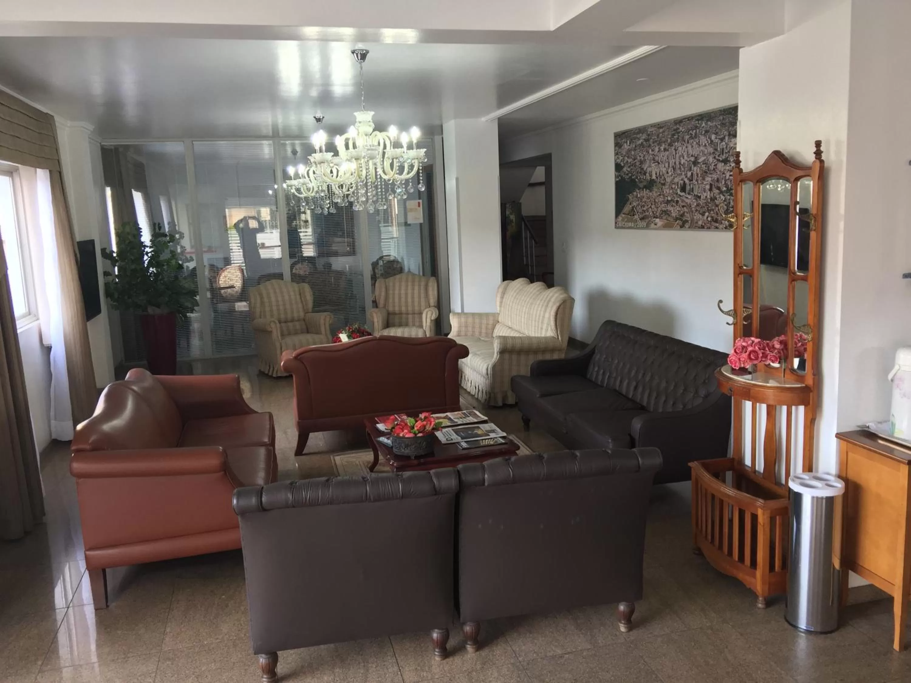 Communal lounge/ TV room, Lobby/Reception in Colle Tourist Hotel