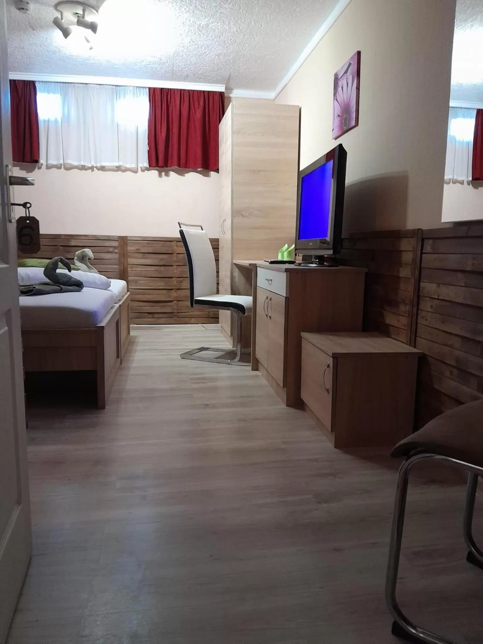 TV/Entertainment Center in Abszolút Hotel és Panzió