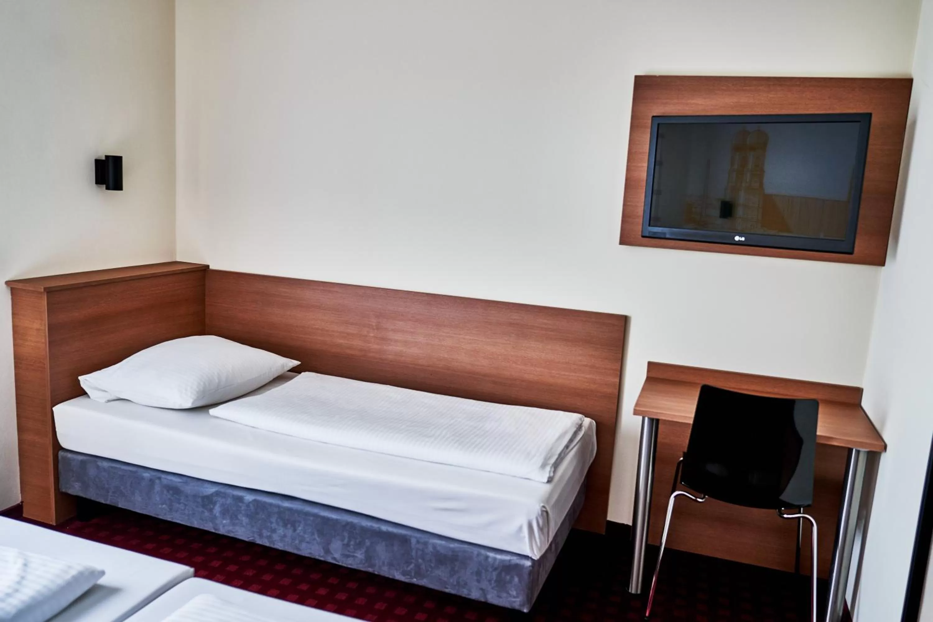 Bed in McDreams Hotel München - Messe