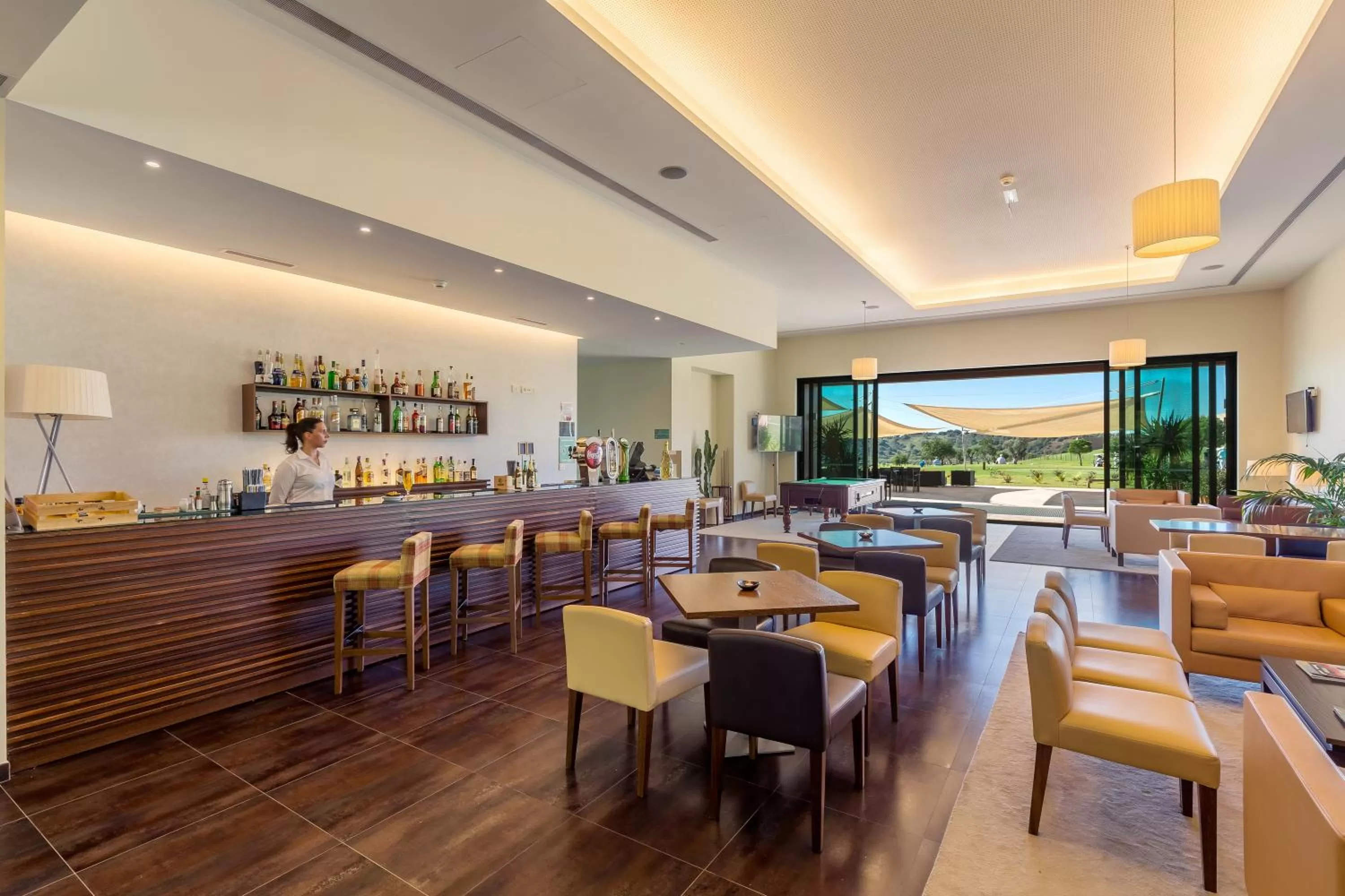 Lounge or bar in NAU Morgado Golf & Country Club