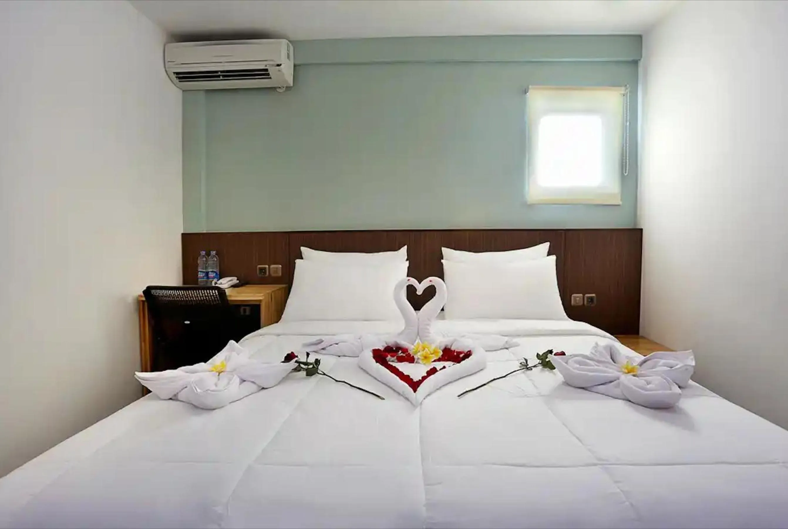 Bed in Duo Legian Hotel