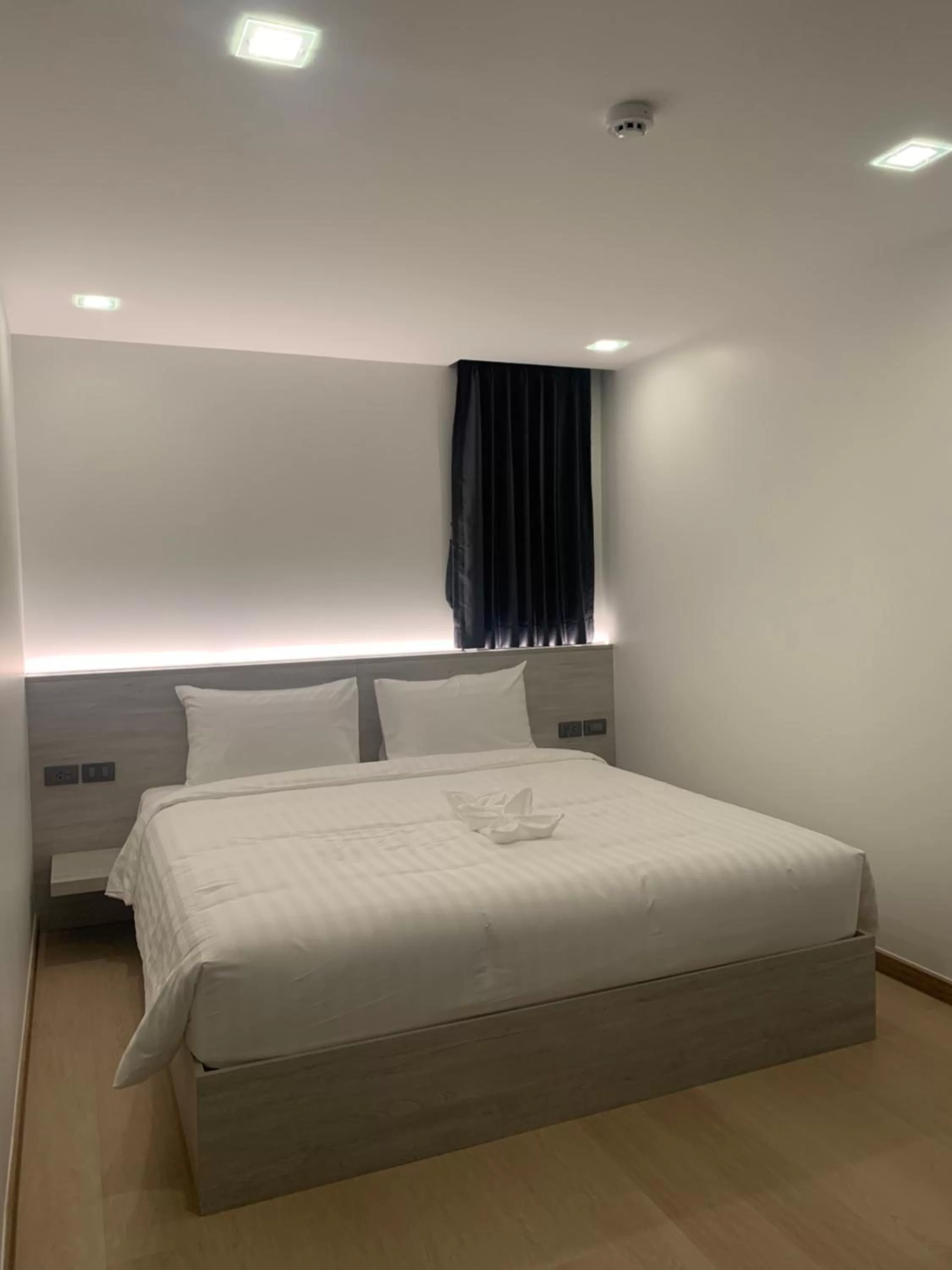 Bed in Thana Wisut Hotel