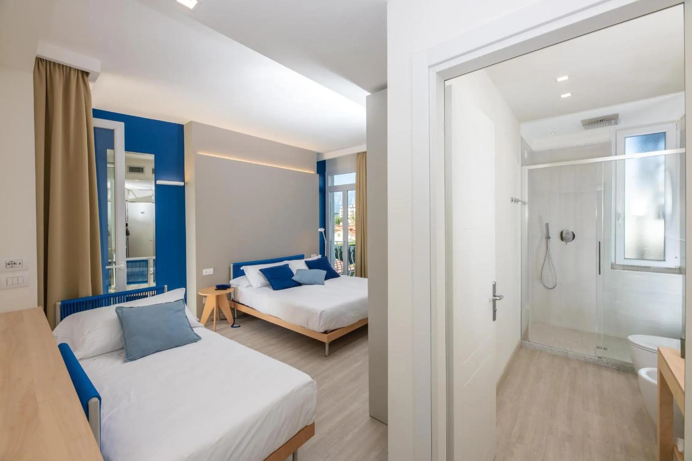 Bathroom, Bed in Amarina Hotel