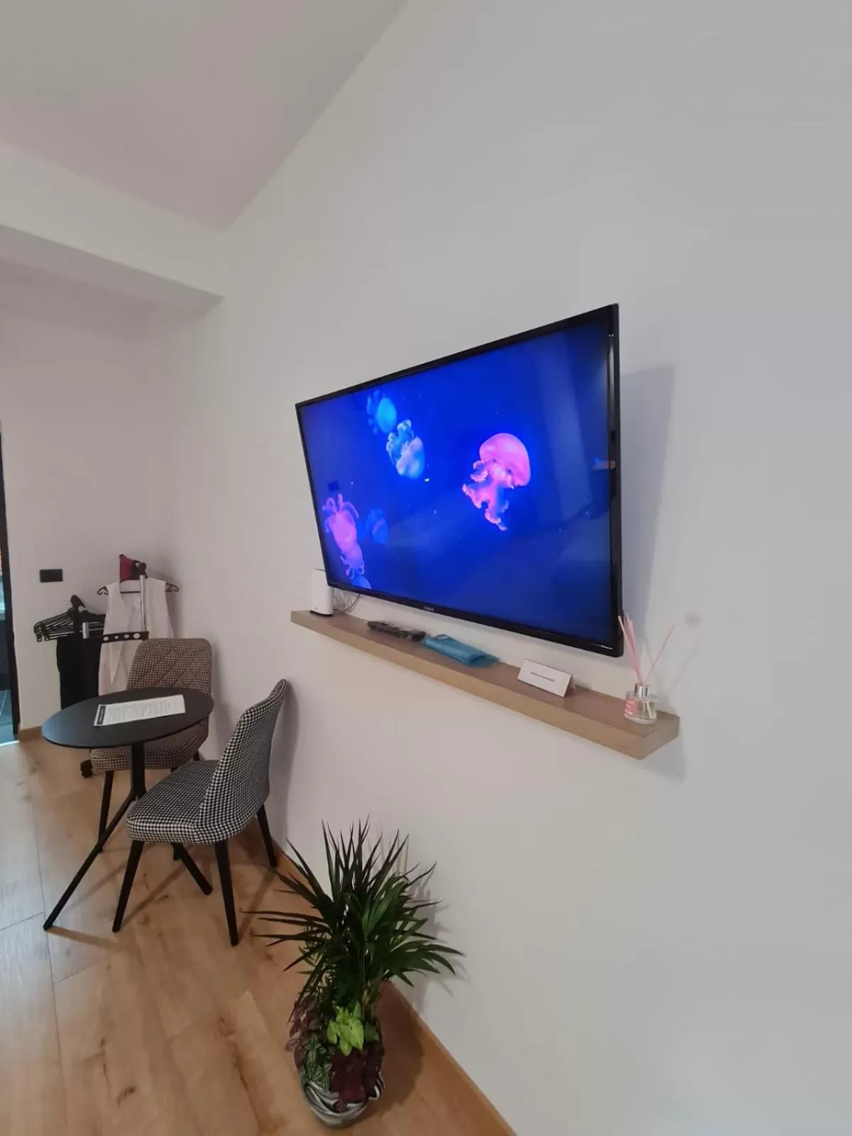 Communal lounge/ TV room in Vila Jasmine