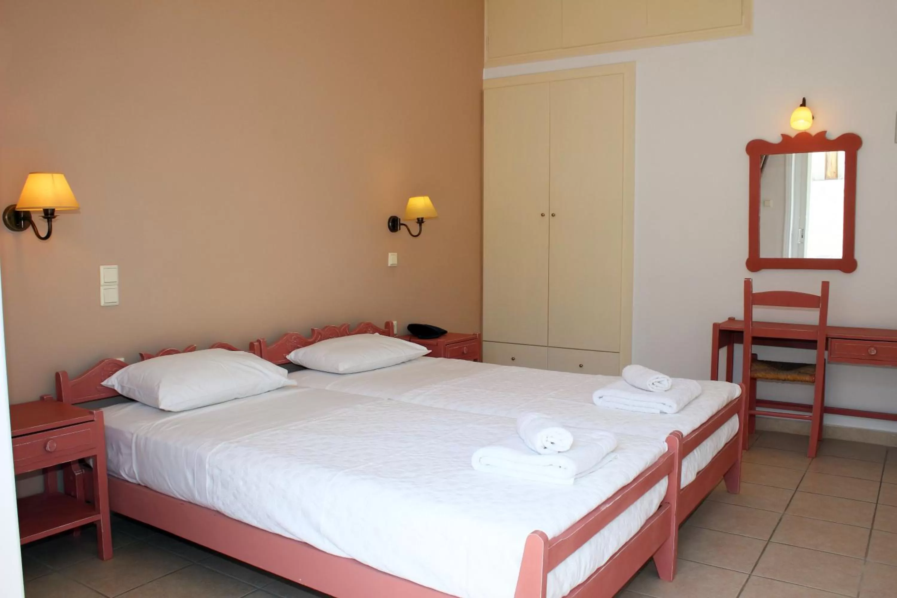 Bed in Ikaros Art Hotel