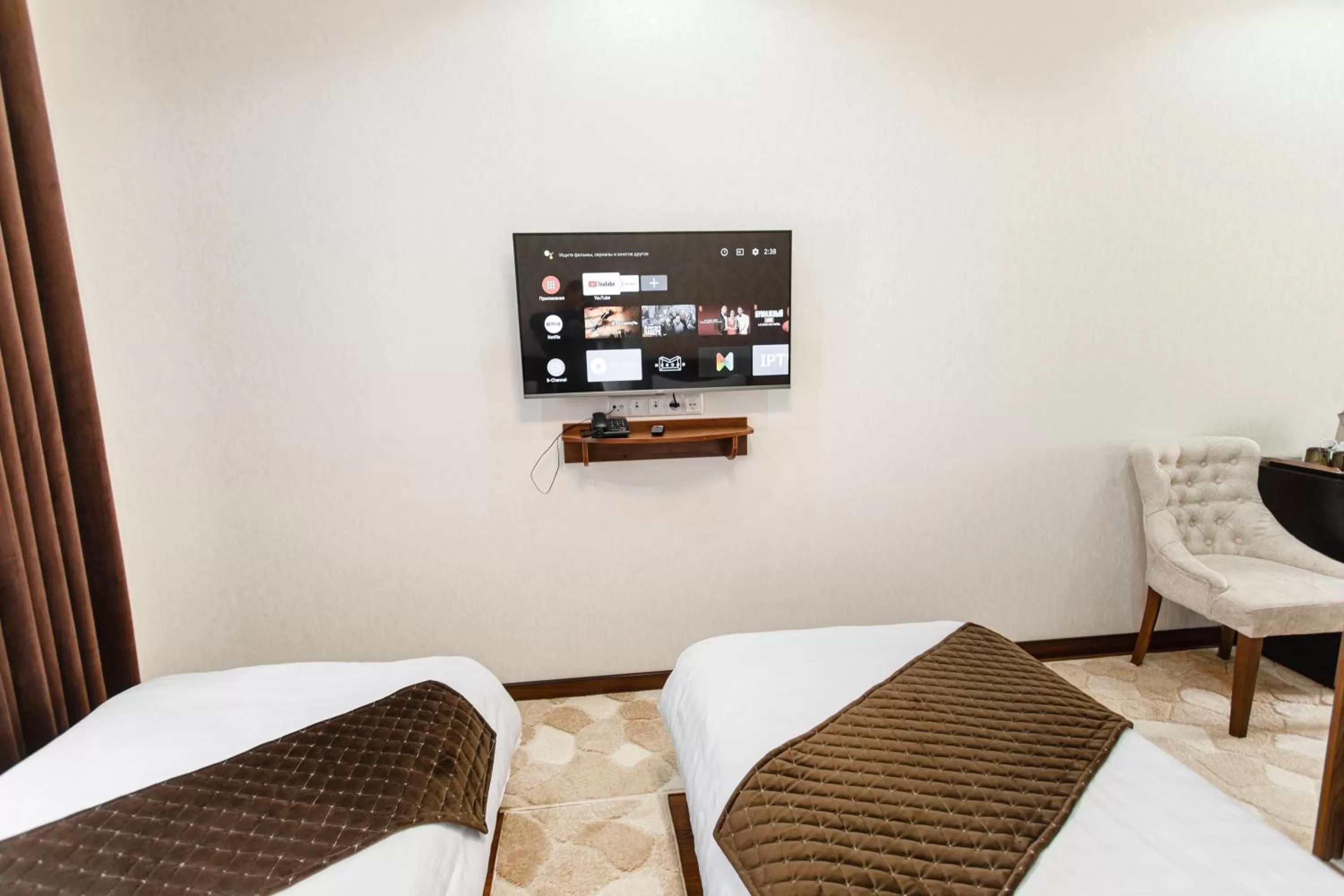 Photo of the whole room, TV/Entertainment Center in Diyor Gold Hotel